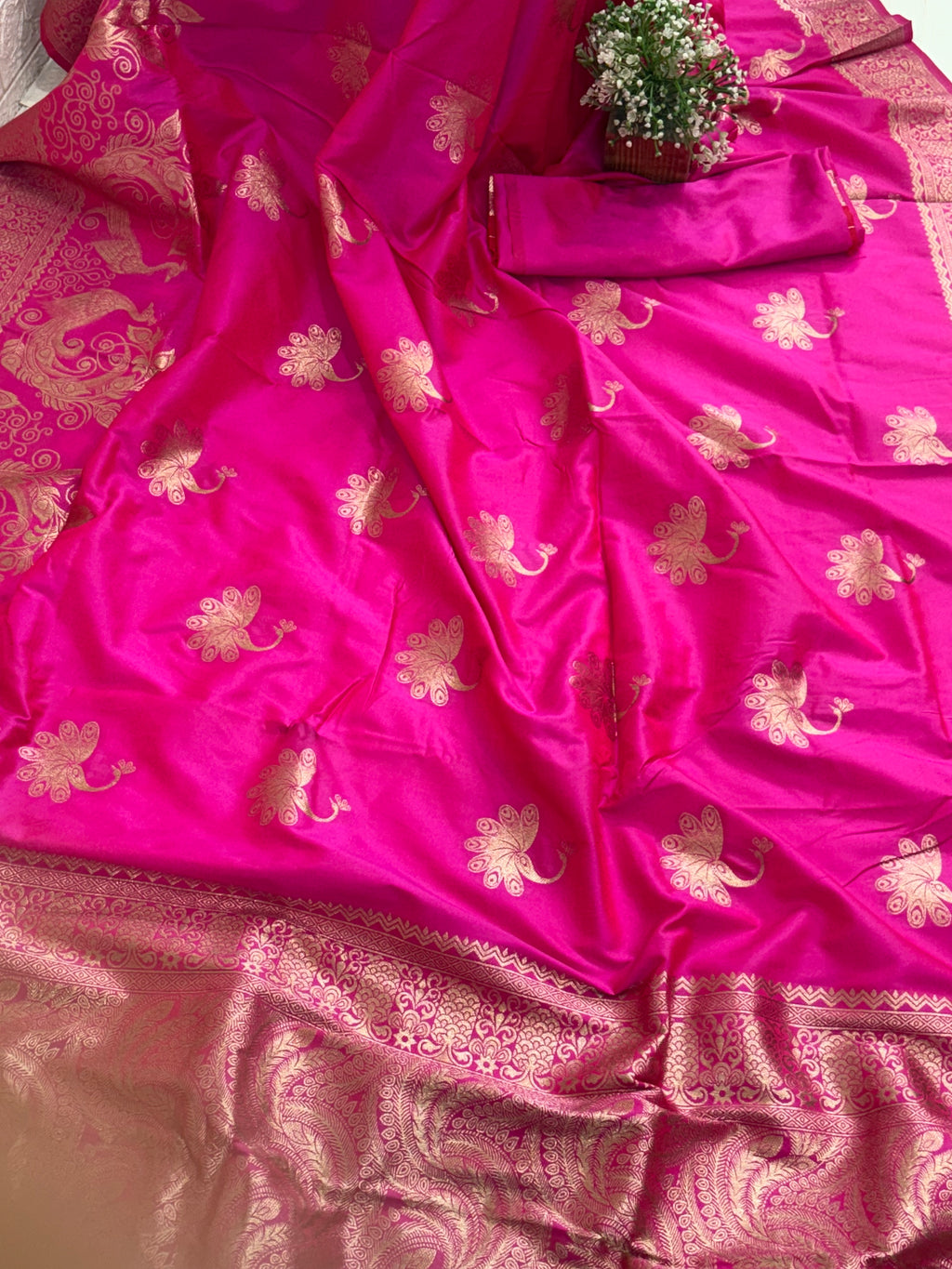 Name: Banarasi Silk Brocade Saree Silk with intricate Zari (metallic thread) Brocade weaving. (The specific silk is often Katan Silk or a silk blend) sarees are best for festival