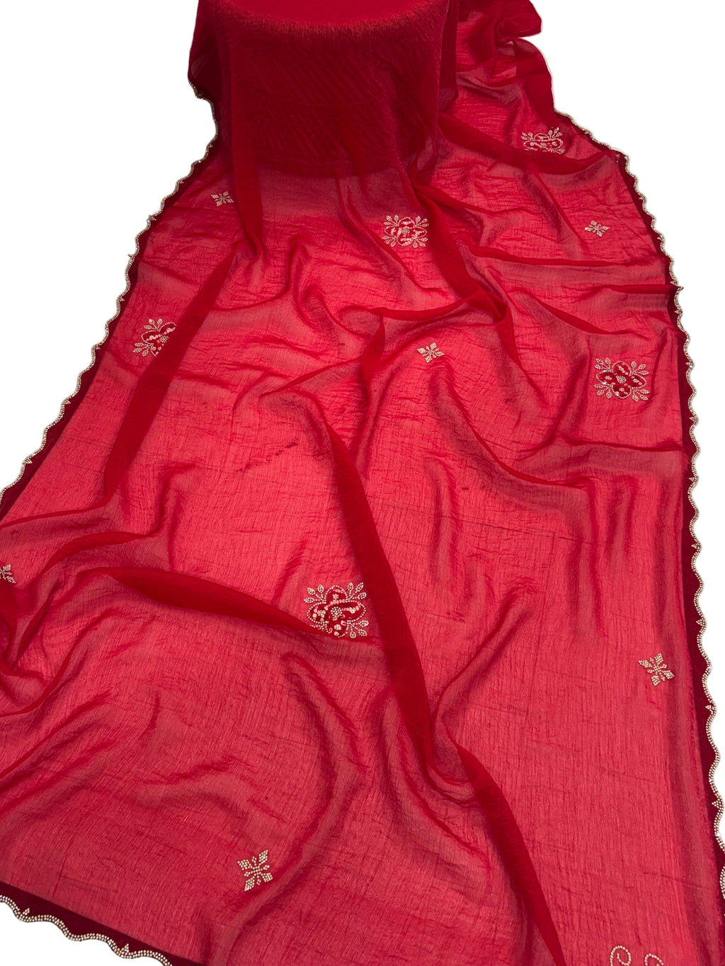 Name: Crimson Blossom Embroidered Saree
Fabric: crepe silk with delicate white thread and Maching Badhani blouse mirror embroidery perfect for festival
