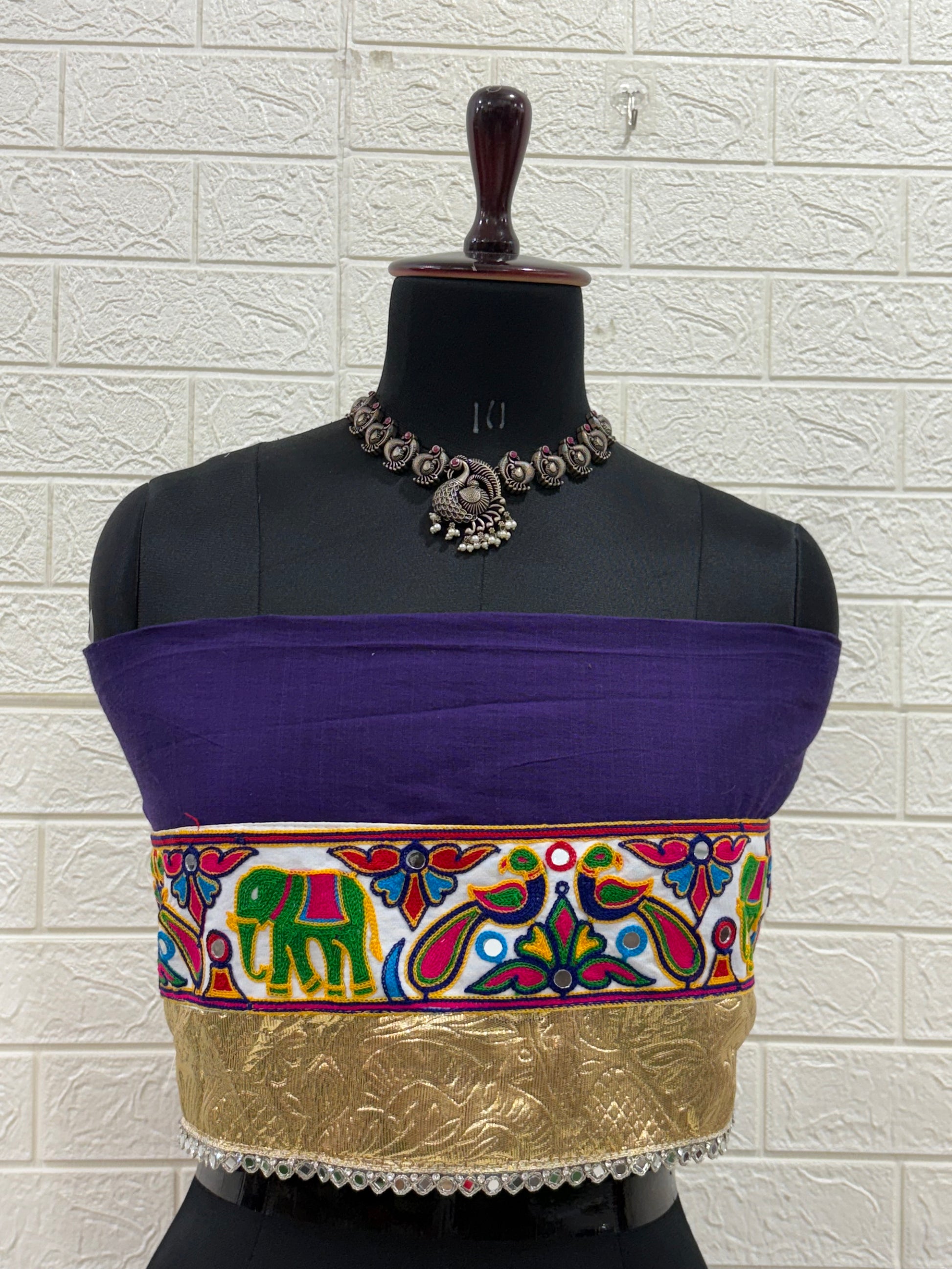 Name:
Purple Navratri Ghaghra Choli Crafted in soft cotton with a vibrant embroidered choli and colorful bandhani dupatta, this ghaghra is perfect for Garba nights and festive celebrations.