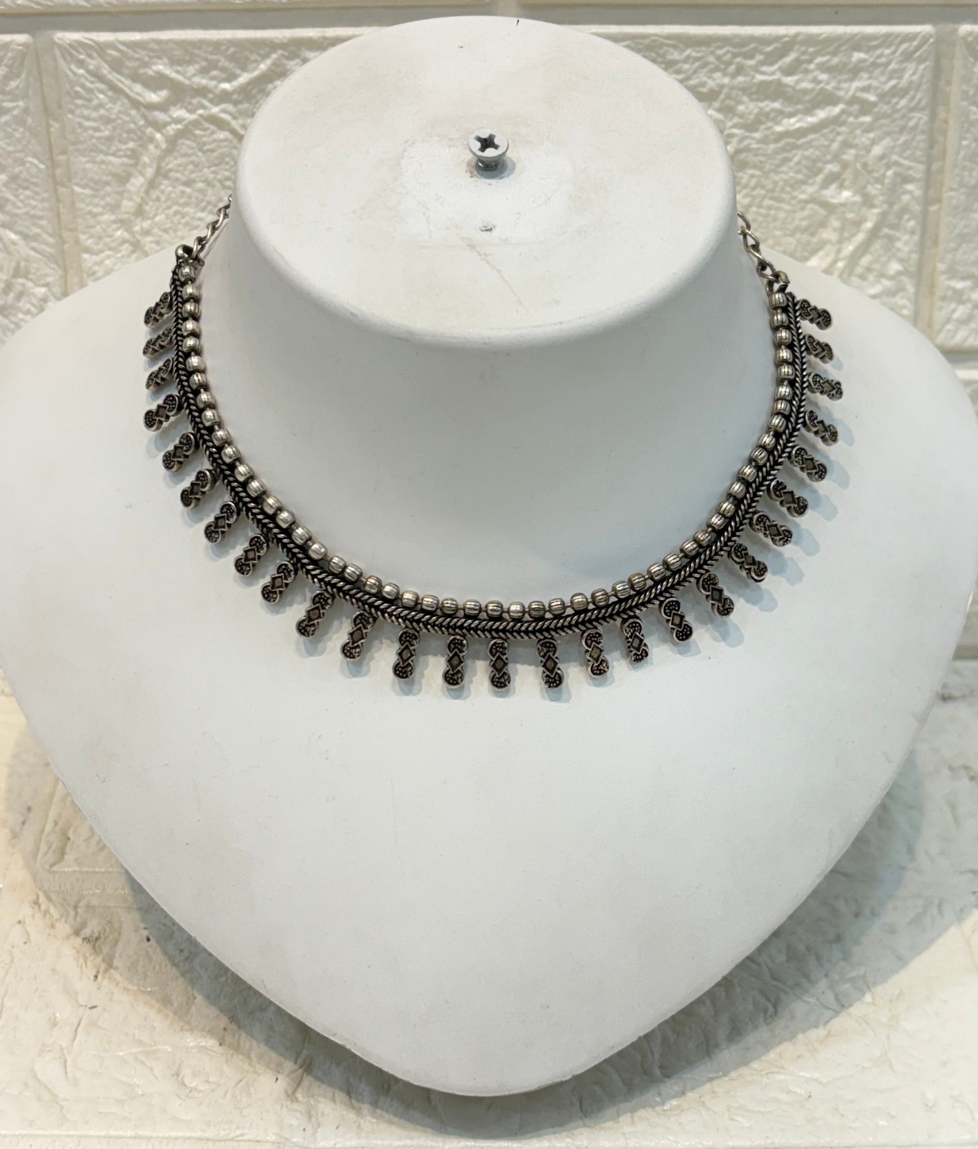 Name: Classic Oxidized Silver Choker Oxidized silver metal with intricate bead and loop detailing