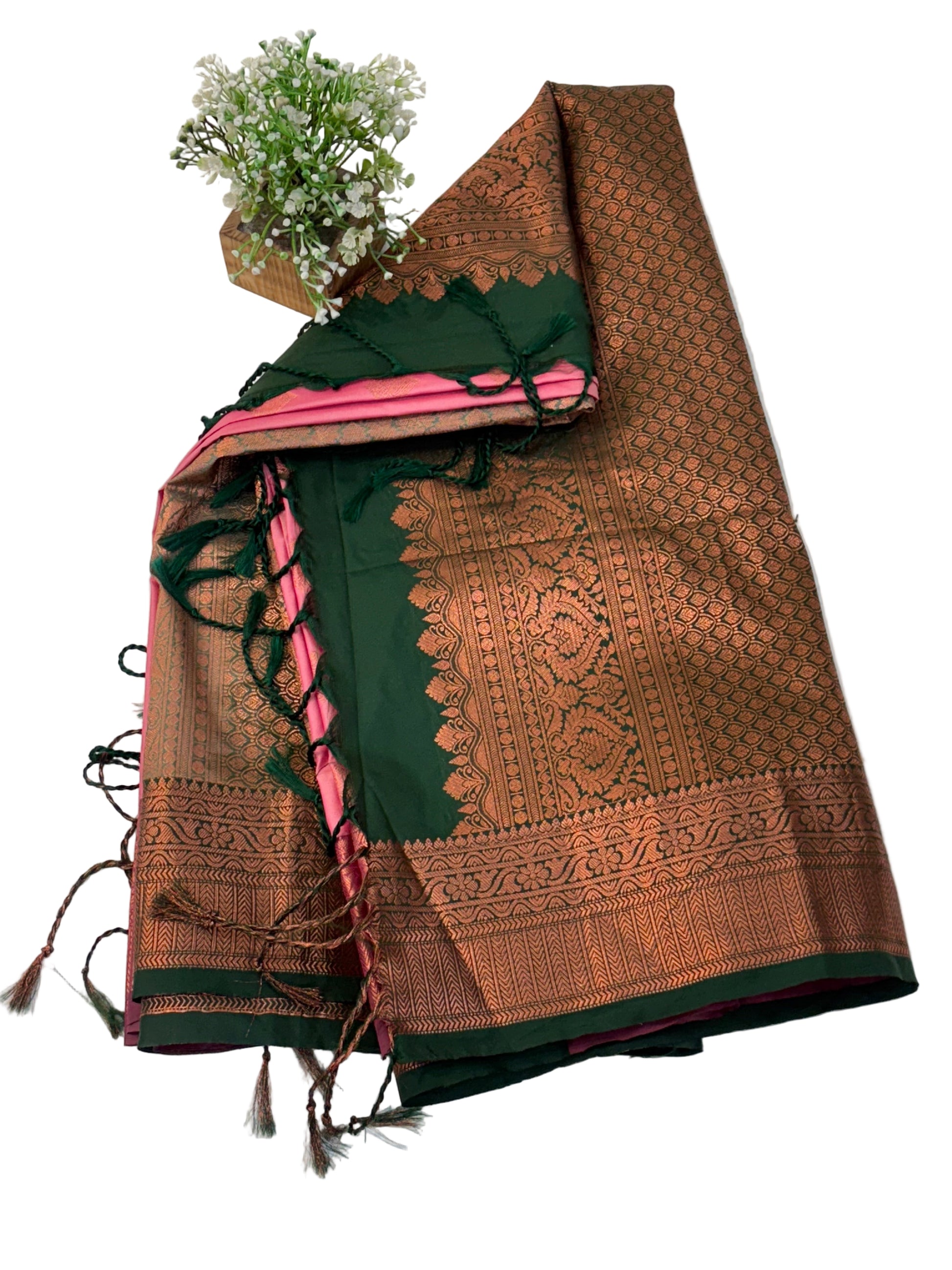 Name: Pink Silk Saree
Fabric: Rich silk with intricate zari weaving and contrast golden border and green colour pallu