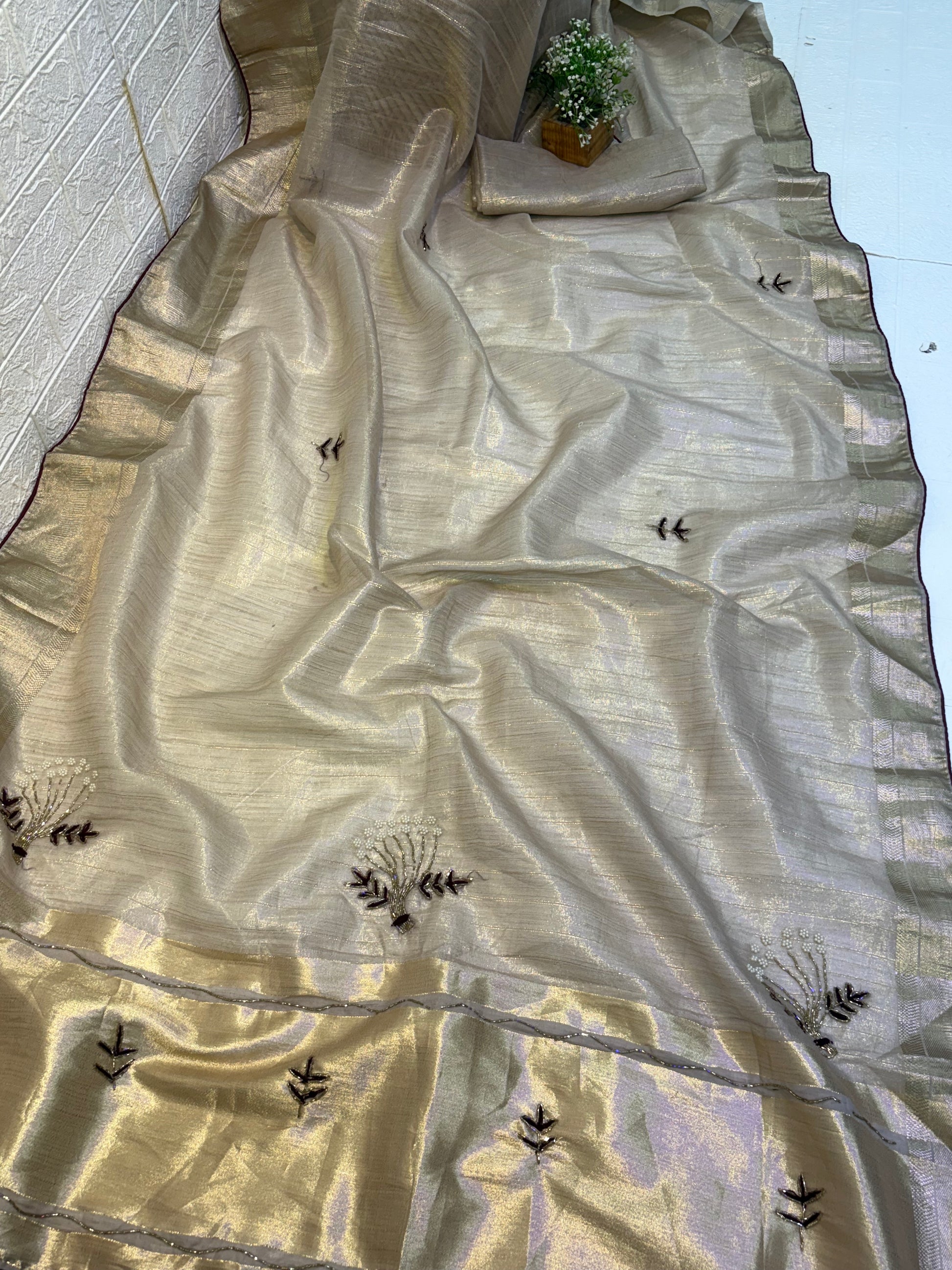 Name: Champagne Gold cotton Shimmering tissue silk fabric with delicate thread and bead floral embroidery, exuding an elegant festive charm.