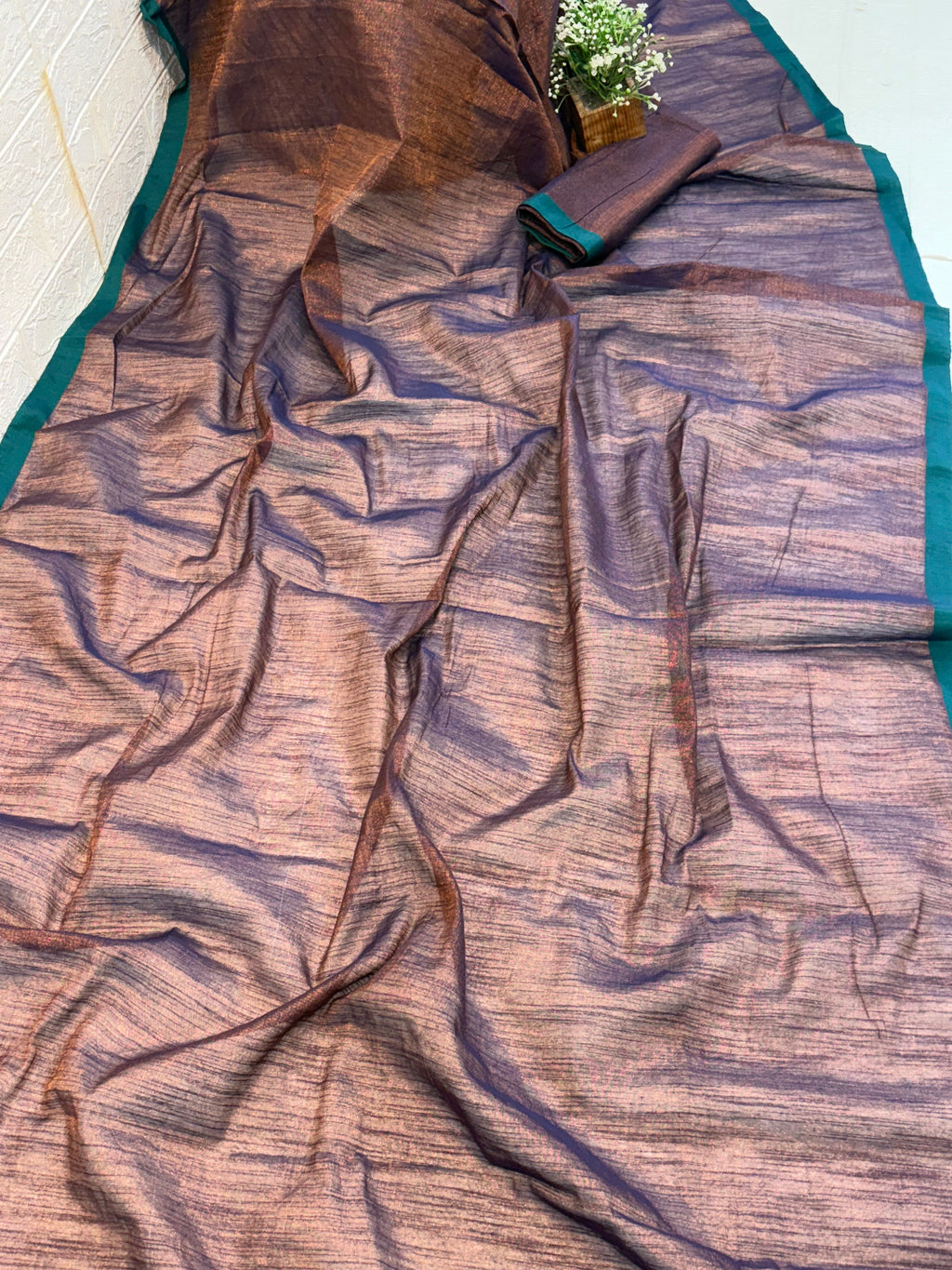 Name: Dual Tone  cotton shimmering Silk Saree Pure with a subtle copper and violet sheen, featuring a green border.