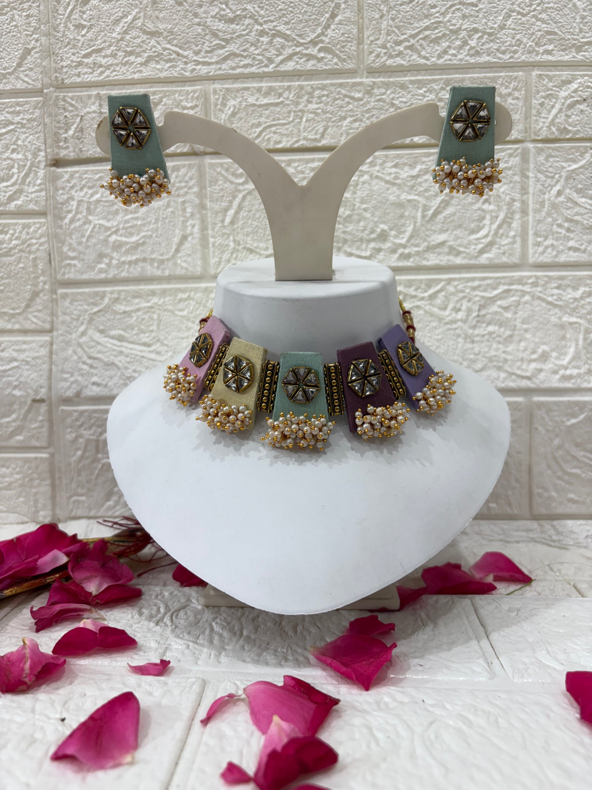 Name: Pastel Kundan Pearl Choker Set

Collection: Elegant Pastel Collection – Handcrafted Kundan & Pearl Jewelry

Would you like me to also create a short product description for your website (highlighting pastel colors, kundan work, and the festive look)