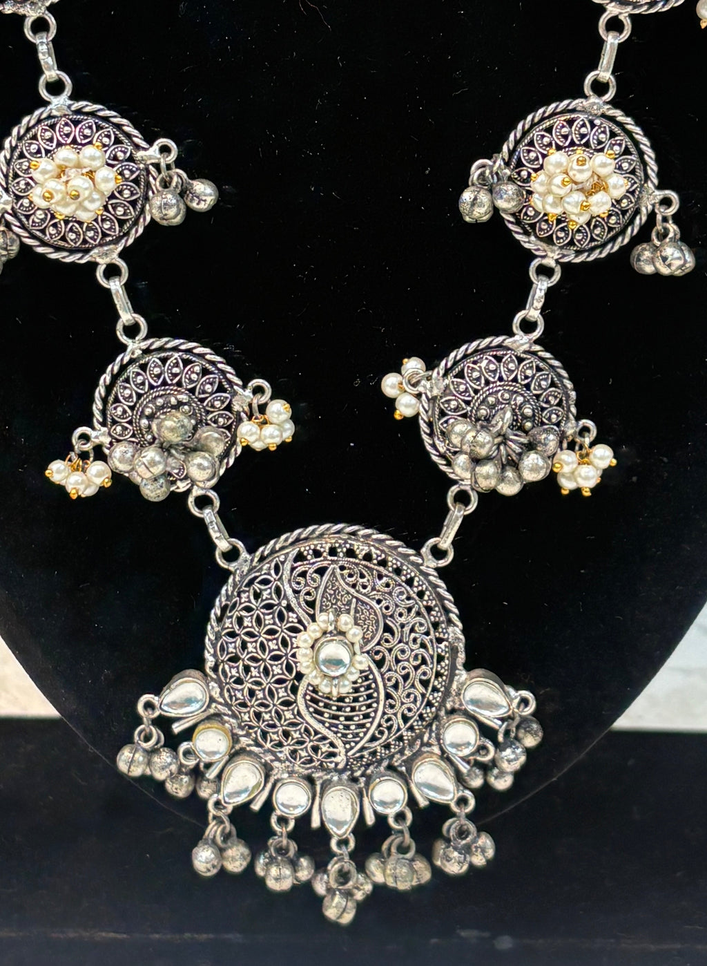 Name: Antique Oxidized Circular Necklace Set German silver with intricate filigree work and pearl bead detailing