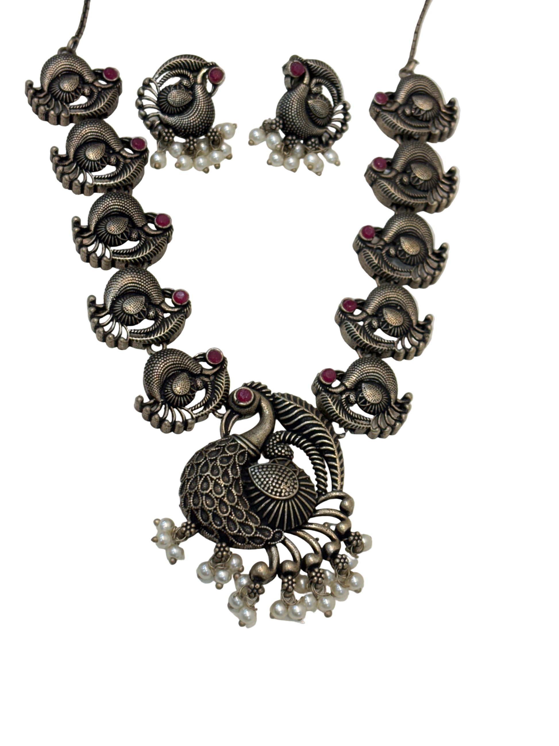 Name: Antique Peacock Oxidized Necklace Set German silver with pink ruby stone accents and pearl bead embellishments