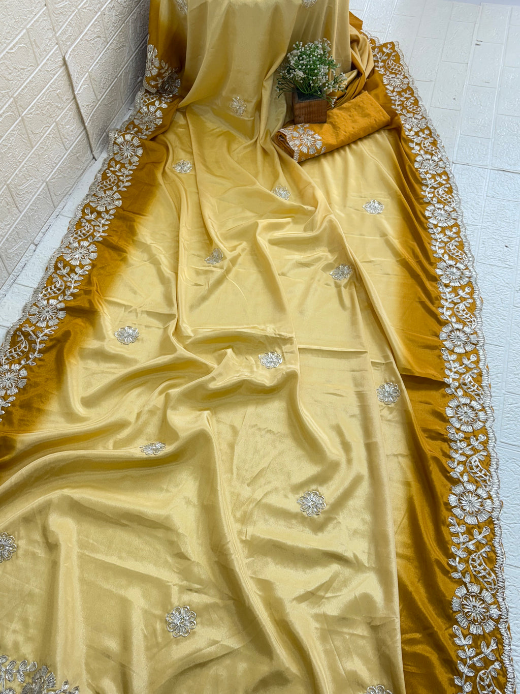 Name: Golden Embroidered Saree with crepe silk intricate white floral gota Patti lace work in silver colour embroidery on the border and motifs across the drape.