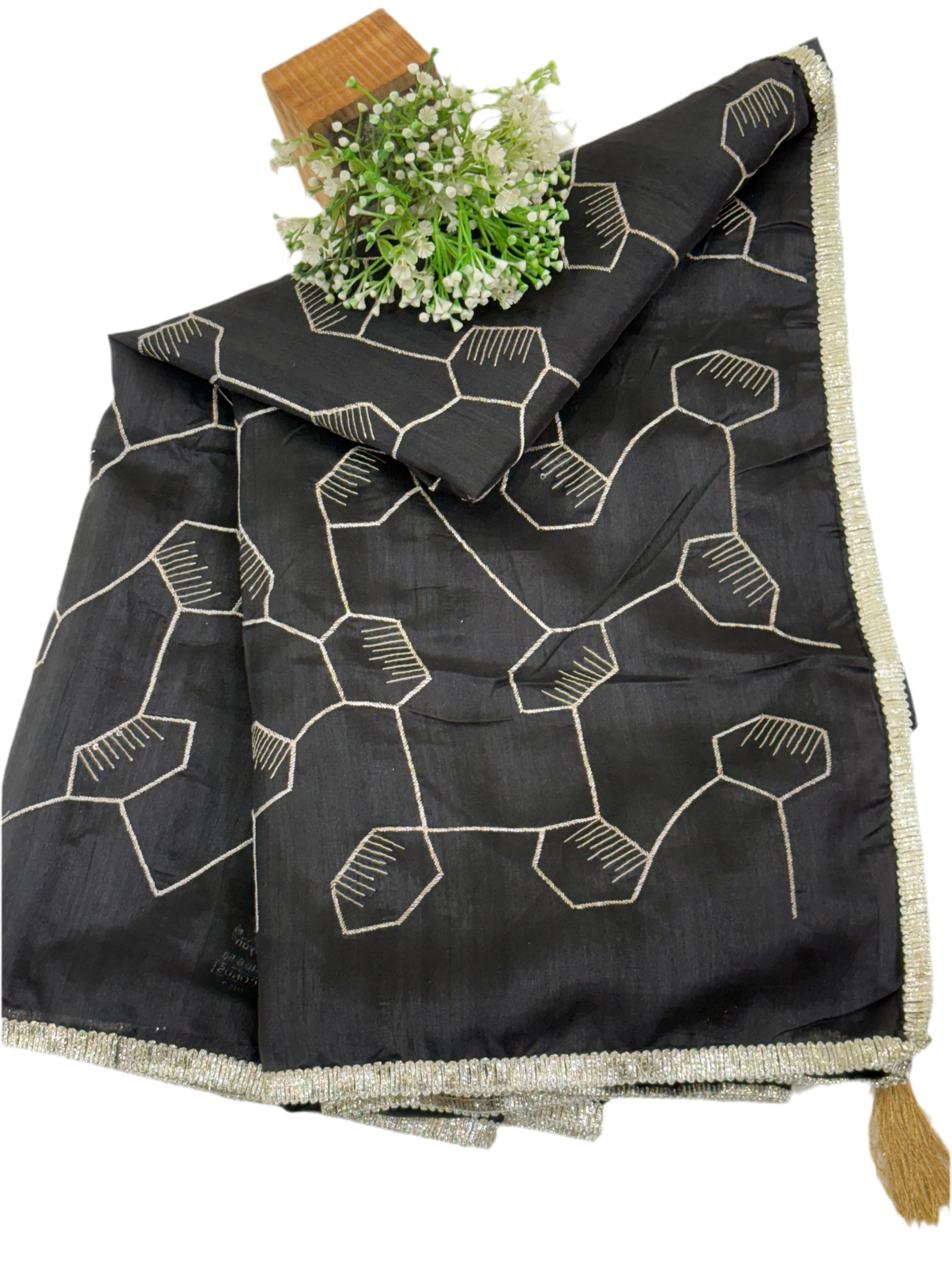 Black Saree This appears to be a silk Blend saree Cotton Silk or Art Silk with a modern Geometric Hexagonal Weave or Jaal design.