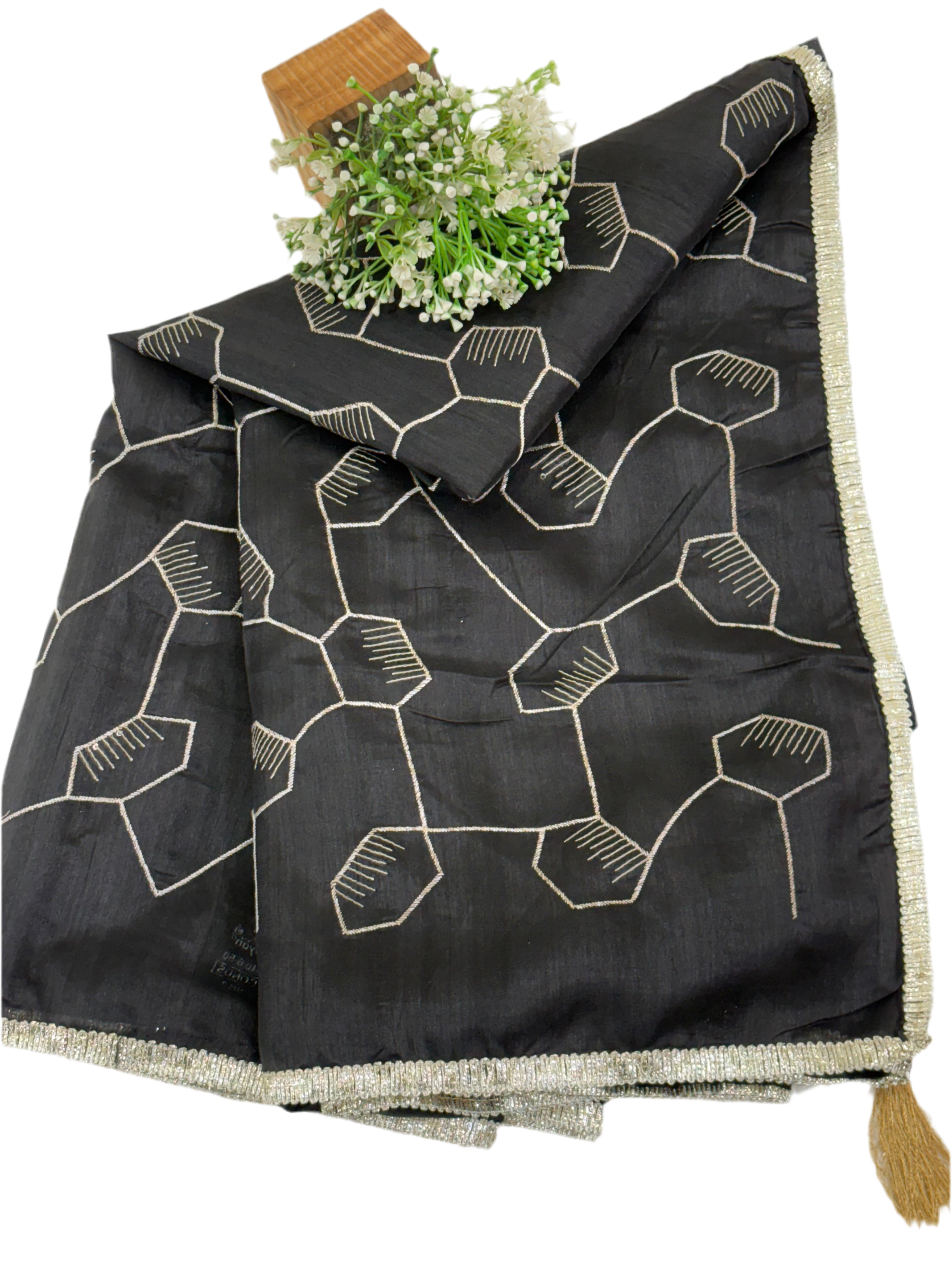 Black Saree This appears to be a silk Blend saree Cotton Silk or Art Silk with a modern Geometric Hexagonal Weave or Jaal design.