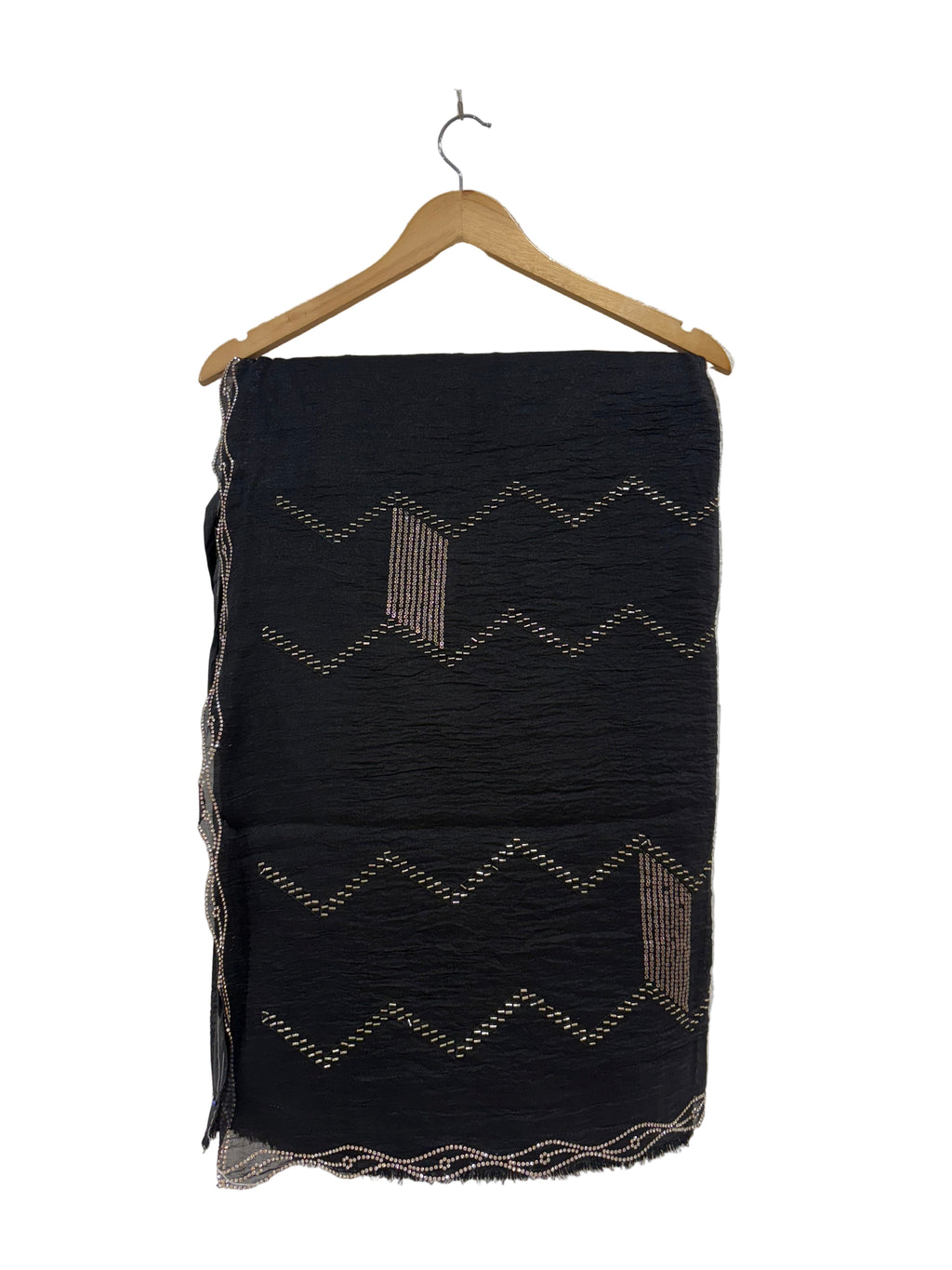 Name: Black Zigzag Embroidered Saree
Fabric: Lightweight crepe georgette with metallic thread embroidery
