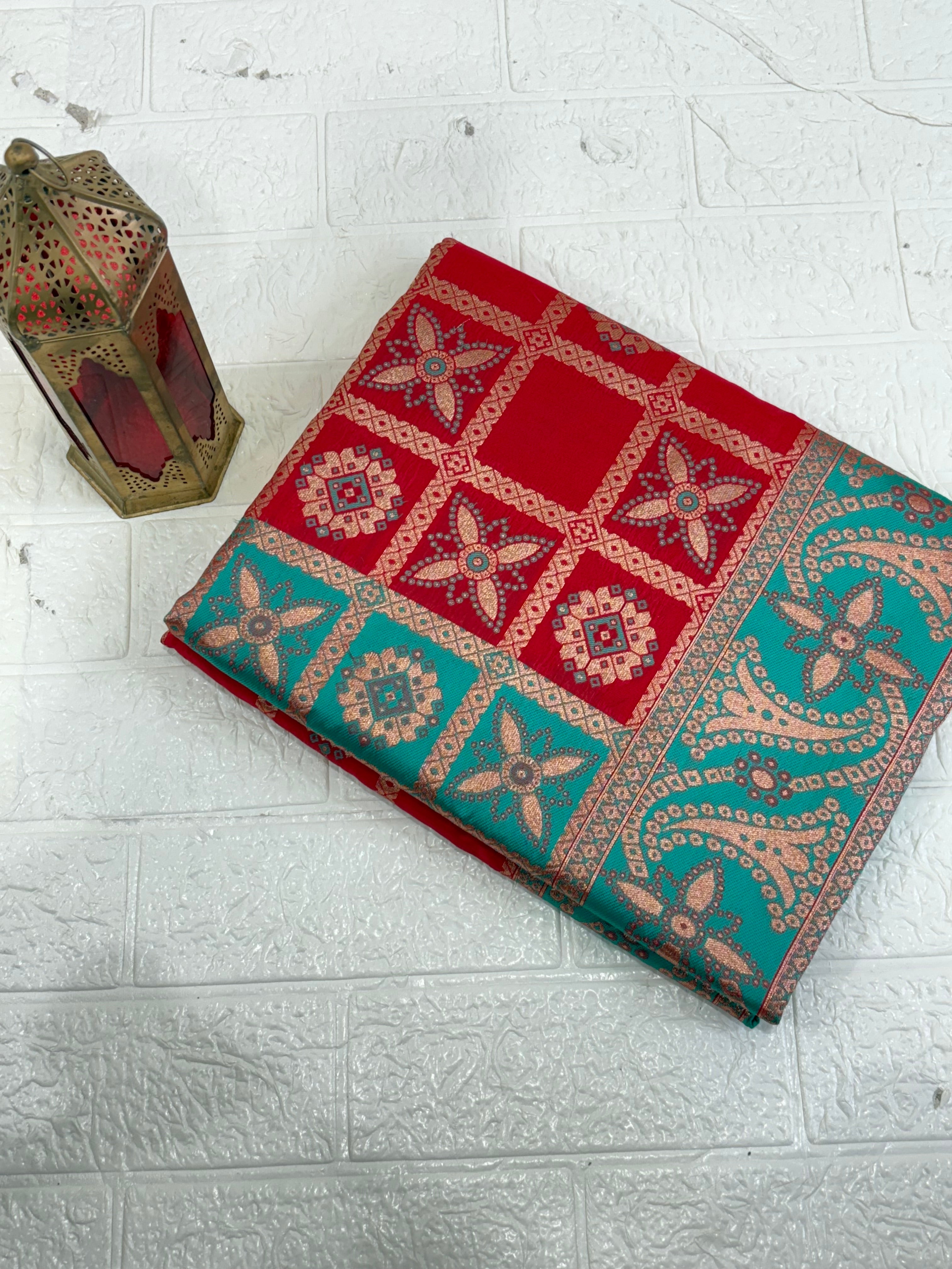 Name red saree fabric pure art silk blend adorned with traditional block print motifs and a contrasting tiffany blue border for a timeless ethnic appeal