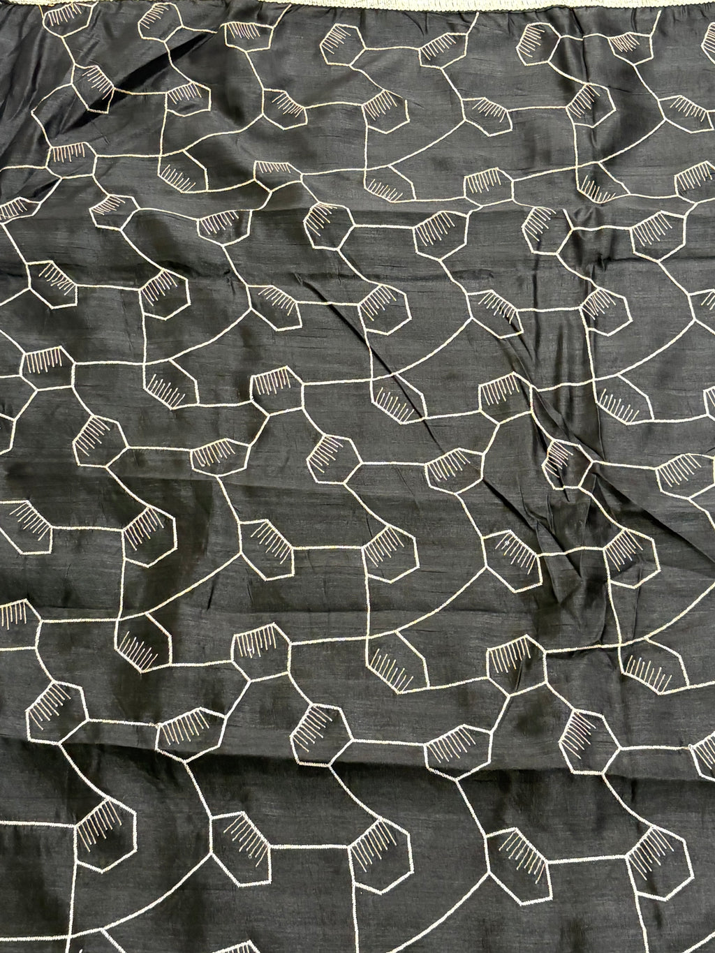 Black Saree This appears to be a silk Blend saree Cotton Silk or Art Silk with a modern Geometric Hexagonal Weave or Jaal design.