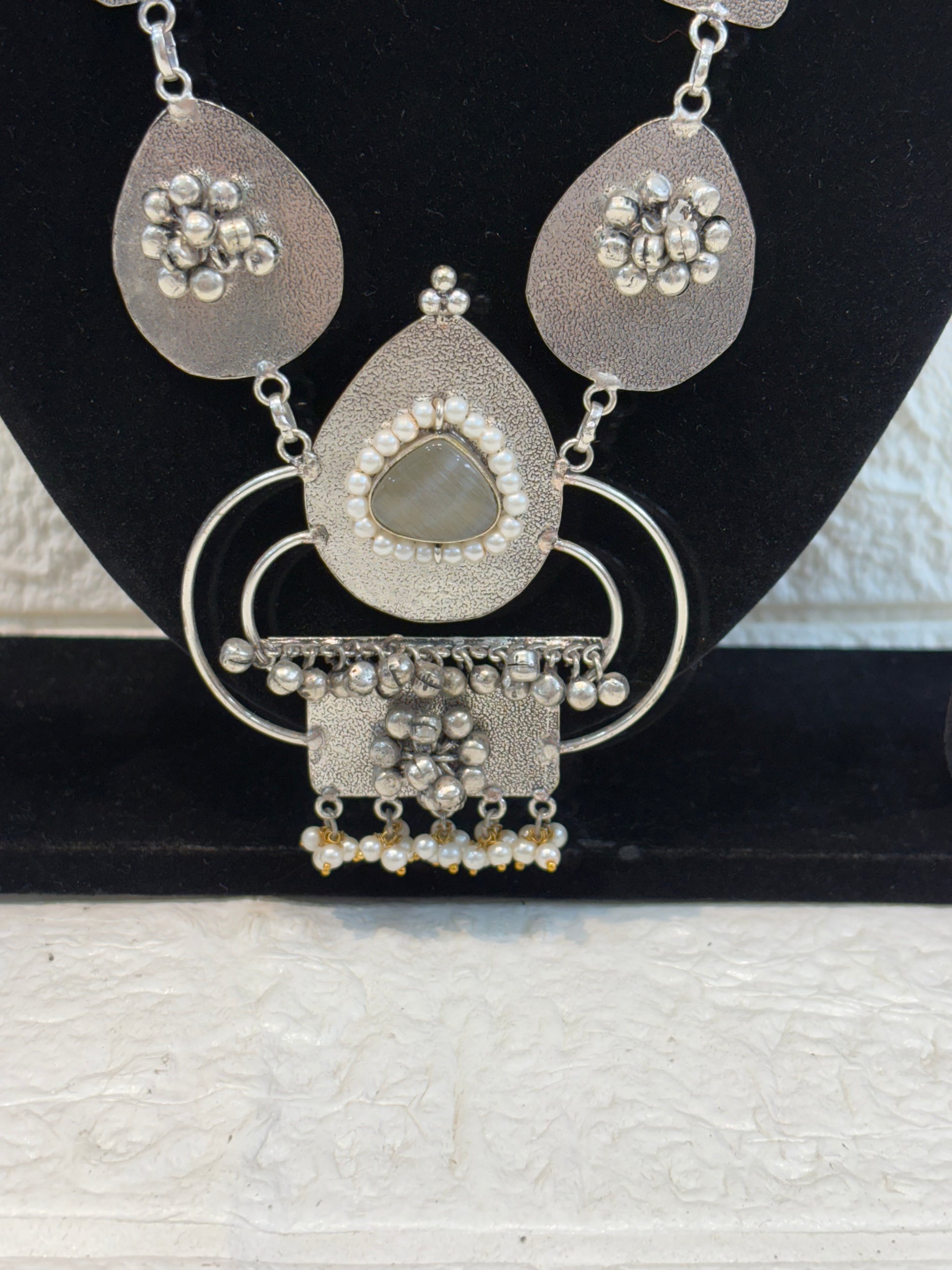 Name: Ethnic Silver Plated Necklace Set Oxidized silver metal with mirror work and pearl bead detailing