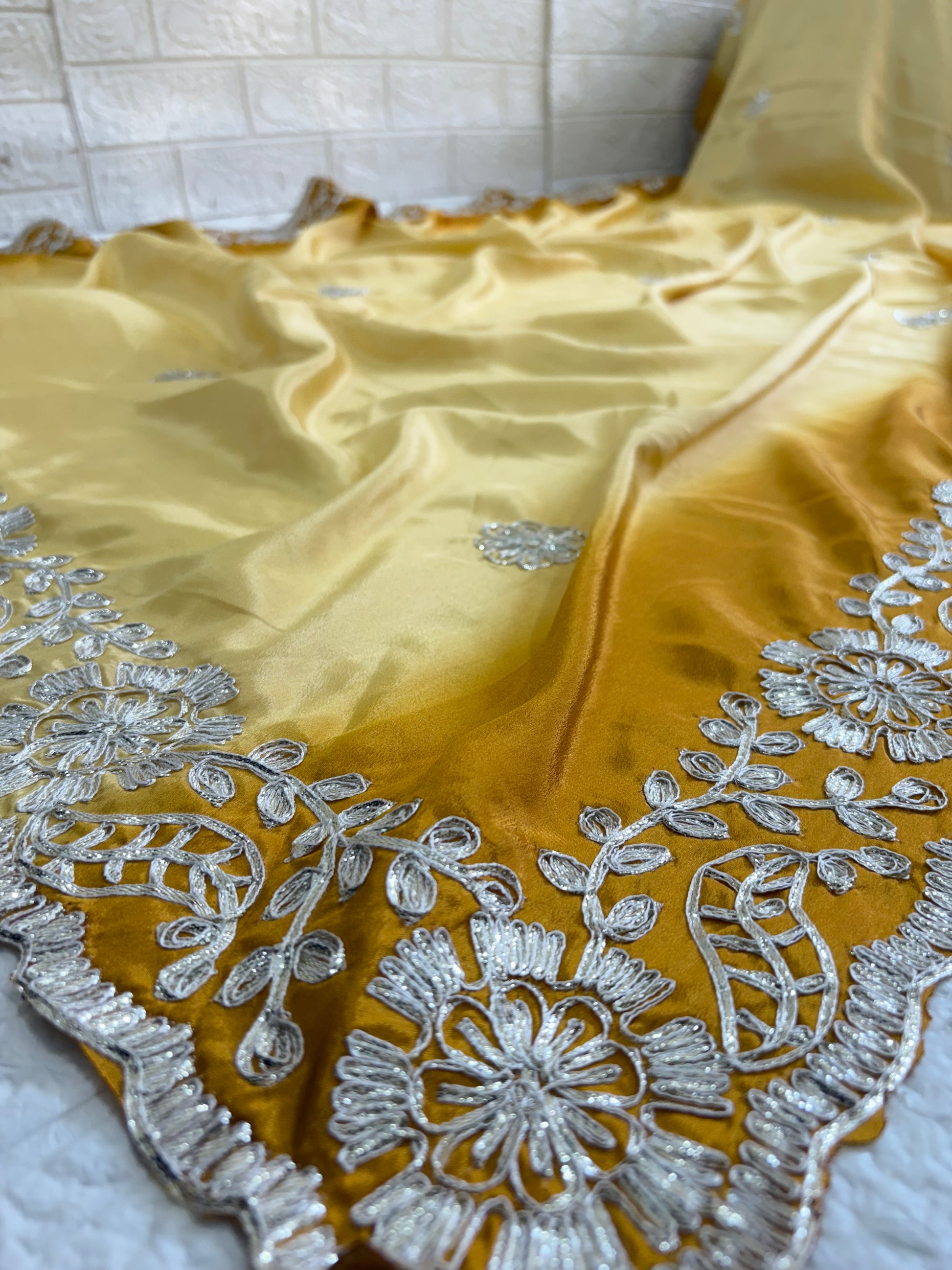 Name: Golden Embroidered Saree with crepe silk intricate white floral gota Patti lace work in silver colour embroidery on the border and motifs across the drape.