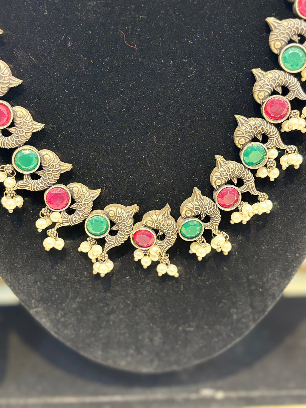 Name: fish Design Oxidized Necklace Set German silver with green and pink stone detailing and pearl drops