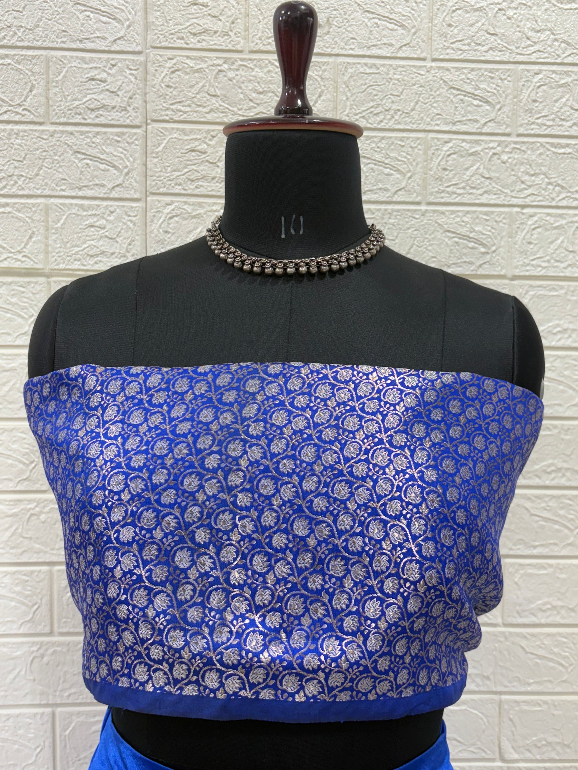 Name: Royal Blue Lehenga & Dupatta A vibrant royal blue crafted in soft pure synthetic satin Lehenga with patchwork,brocade blouse with mirror work Bandhni Dupatta and sequin lace, perfect for festive celebrations.