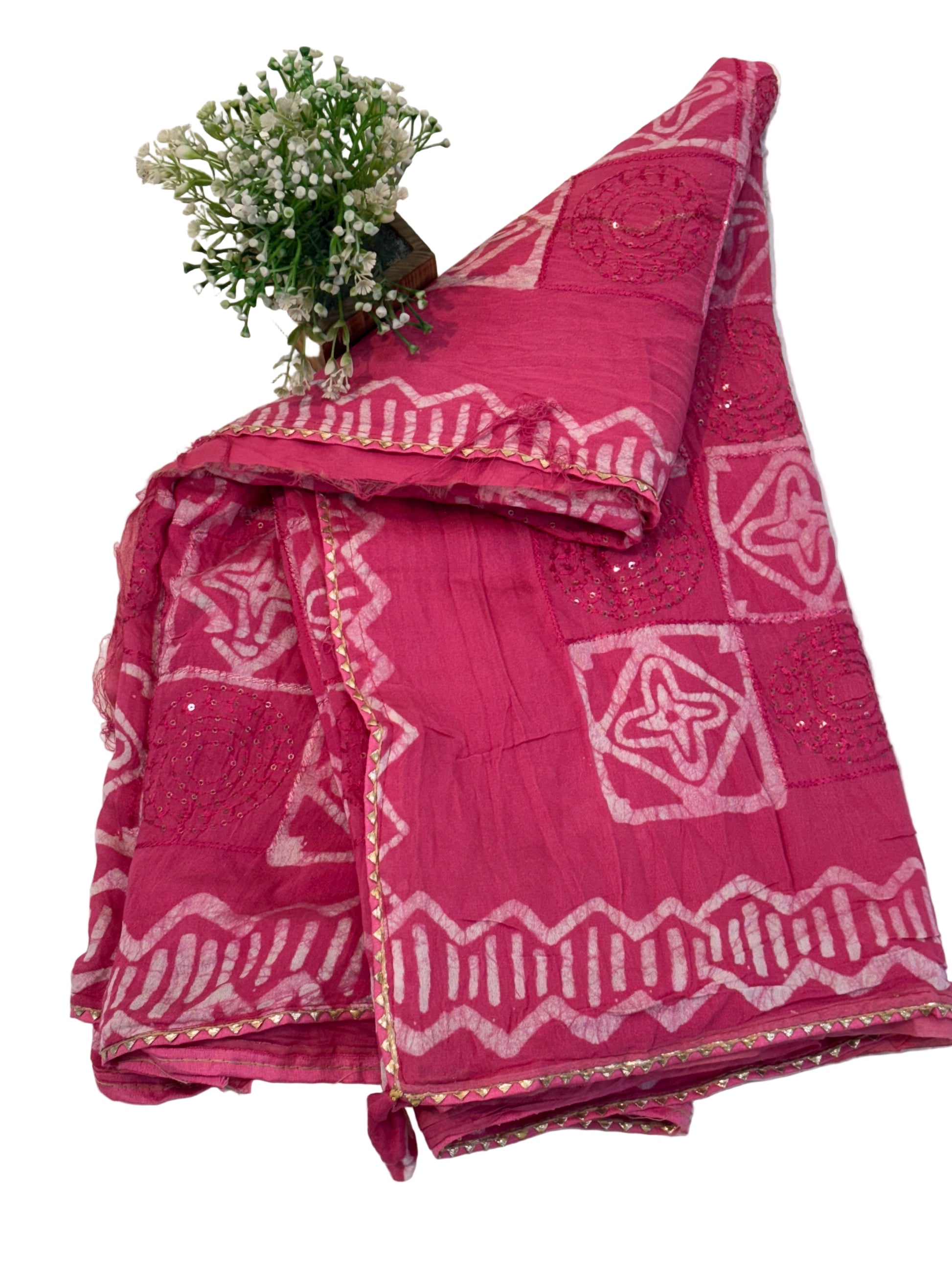 Name: Pink Bandhani Saree
Soft cotton silk with traditional bandhej pattern and sequin embellishments