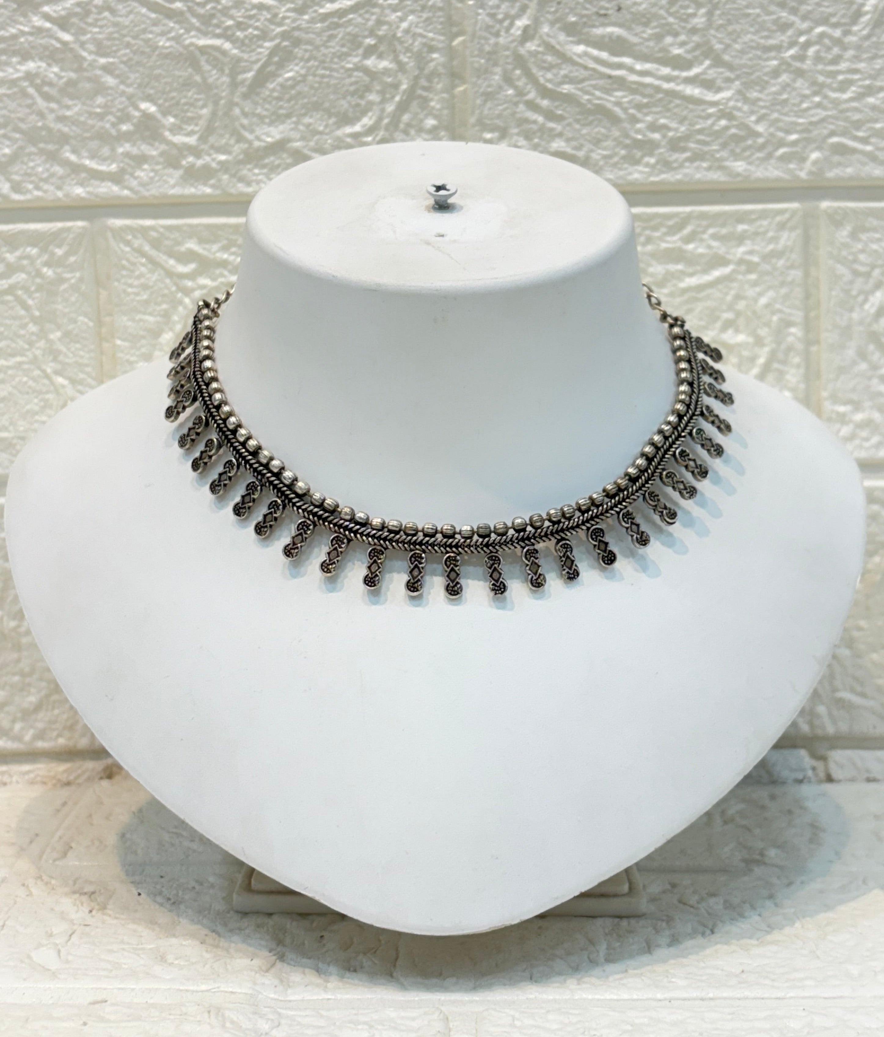 Name: Classic Oxidized Silver Choker Oxidized silver metal with intricate bead and loop detailing