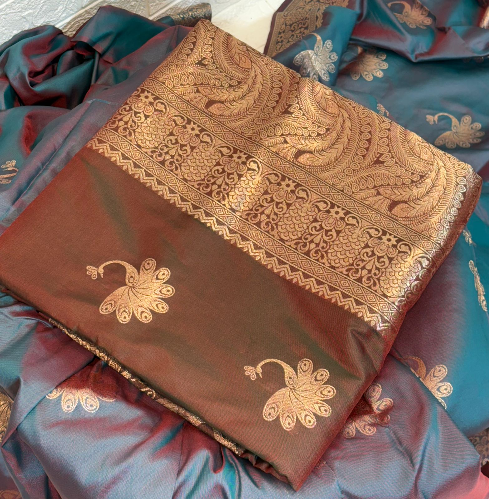 Teal and Maroon Dual-Tone Banarasi Silk Saree with Gold Zari Peacock Motifs