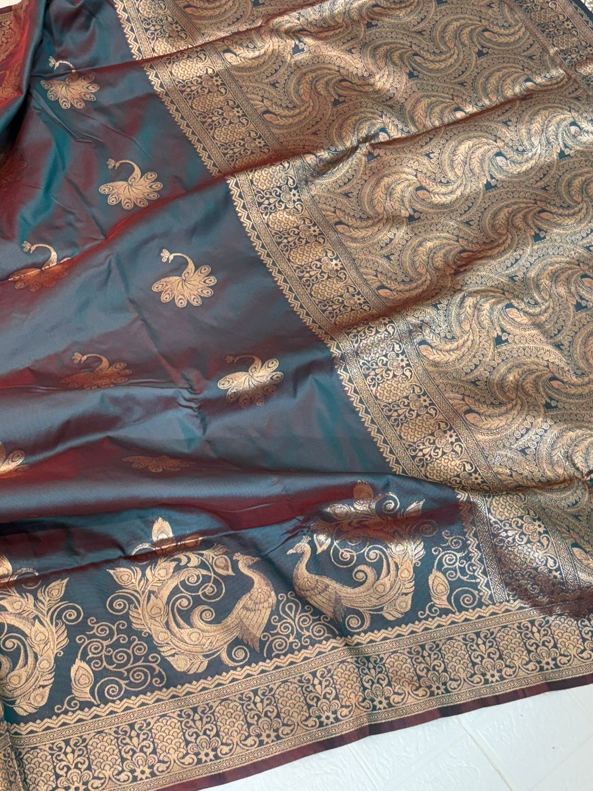 Teal and Maroon Dual-Tone Banarasi Silk Saree with Gold Zari Peacock Motifs