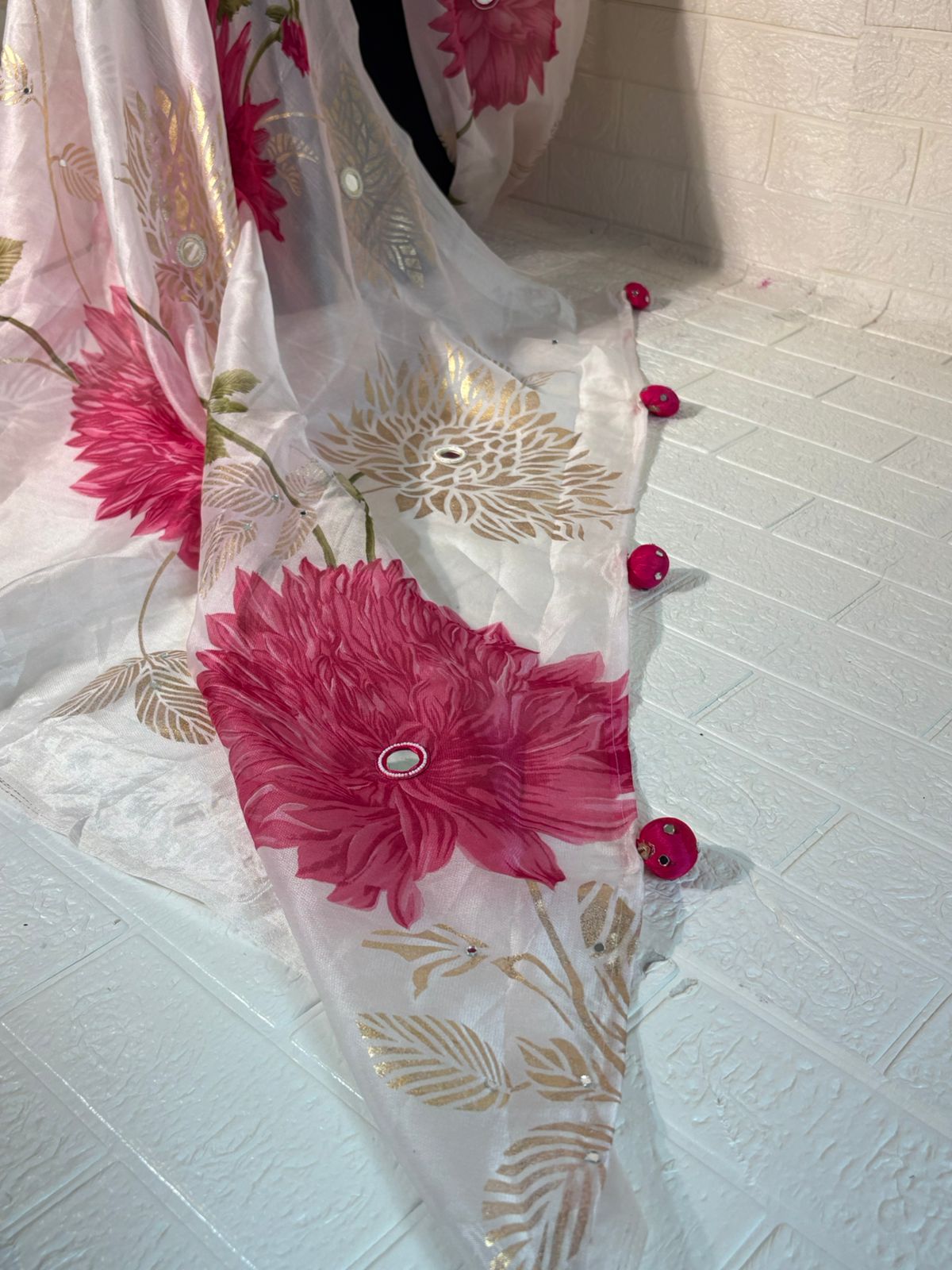 White Organza Saree with Pink Floral Prints and Golden Leaf Detailing