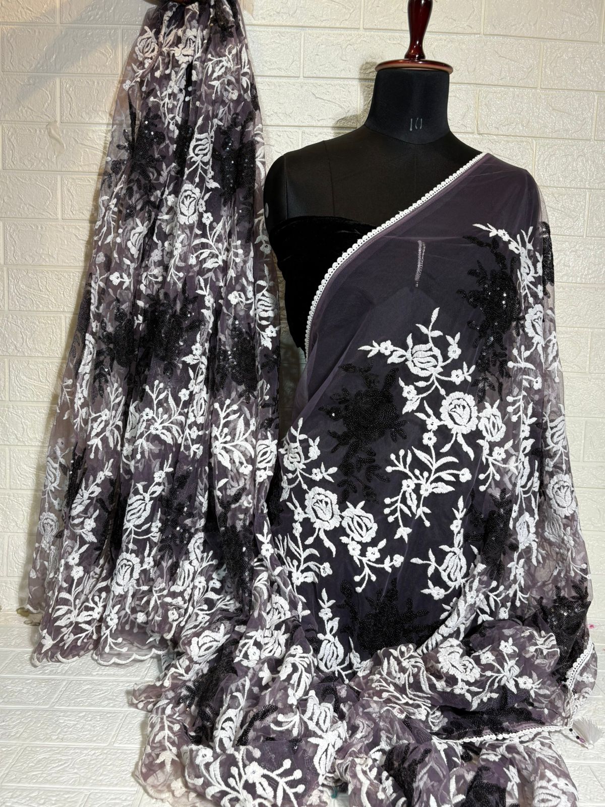 Charcoal Grey Net Saree with White Floral Embroidery and Black Sequin Accents