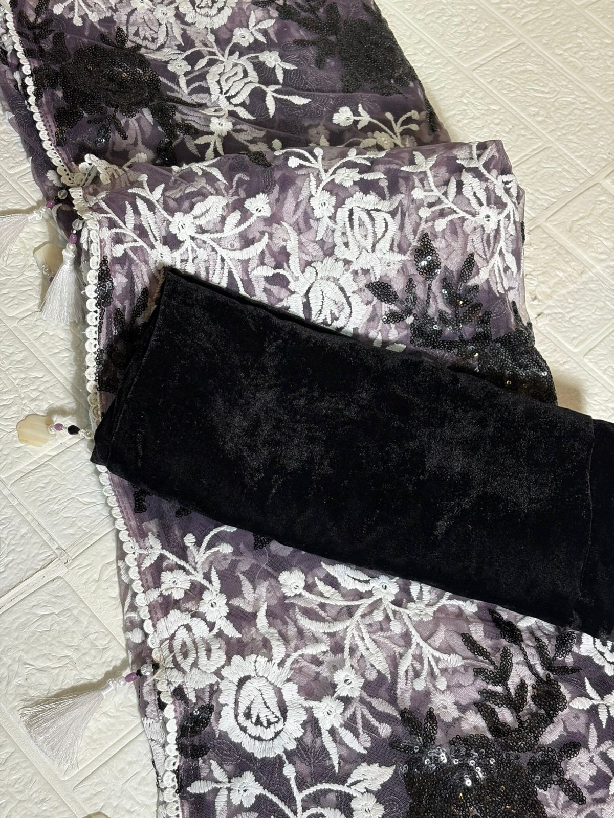 Charcoal Grey Net Saree with White Floral Embroidery and Black Sequin Accents