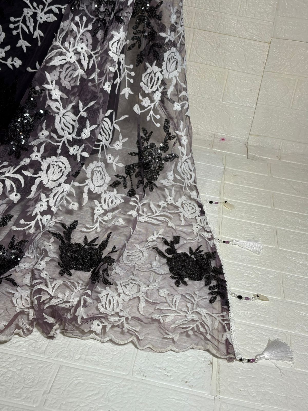 Charcoal Grey Net Saree with White Floral Embroidery and Black Sequin Accents