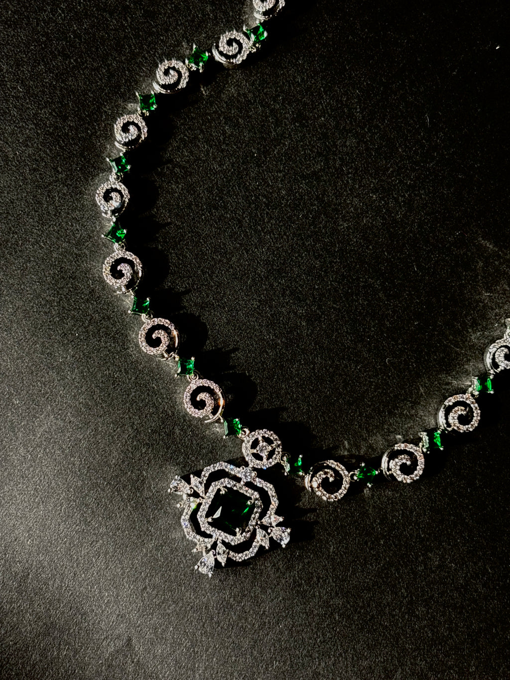 Emerald Whirl Pendant Necklace