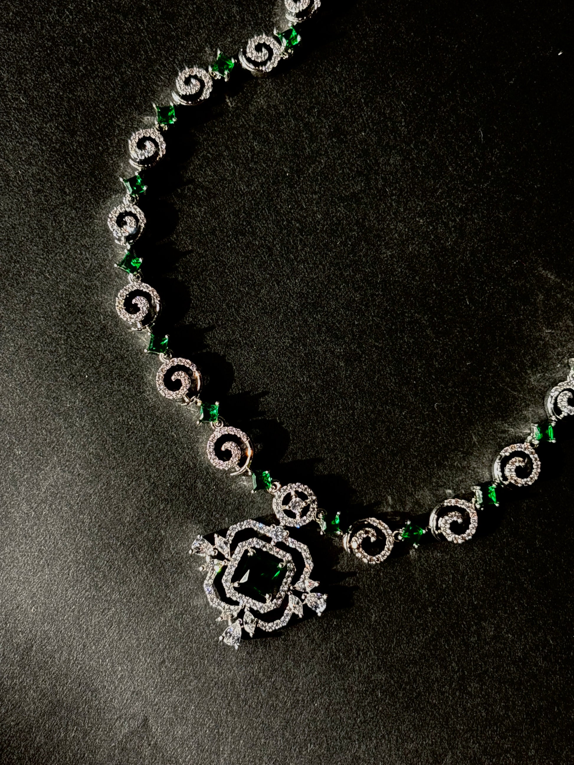Emerald Whirl Pendant Necklace