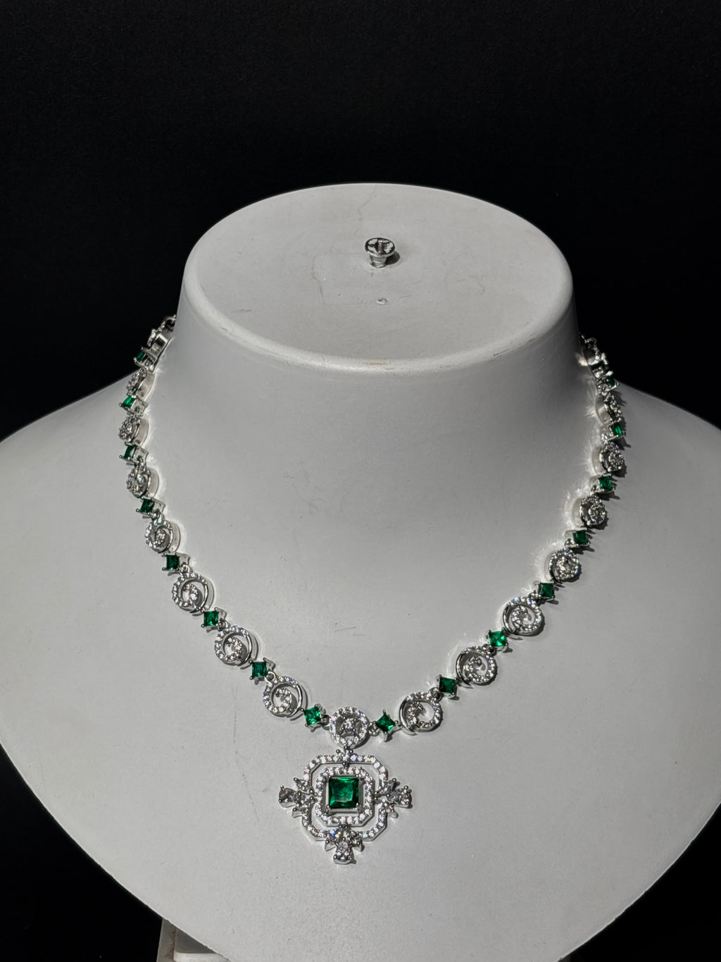 Emerald Whirl Pendant Necklace