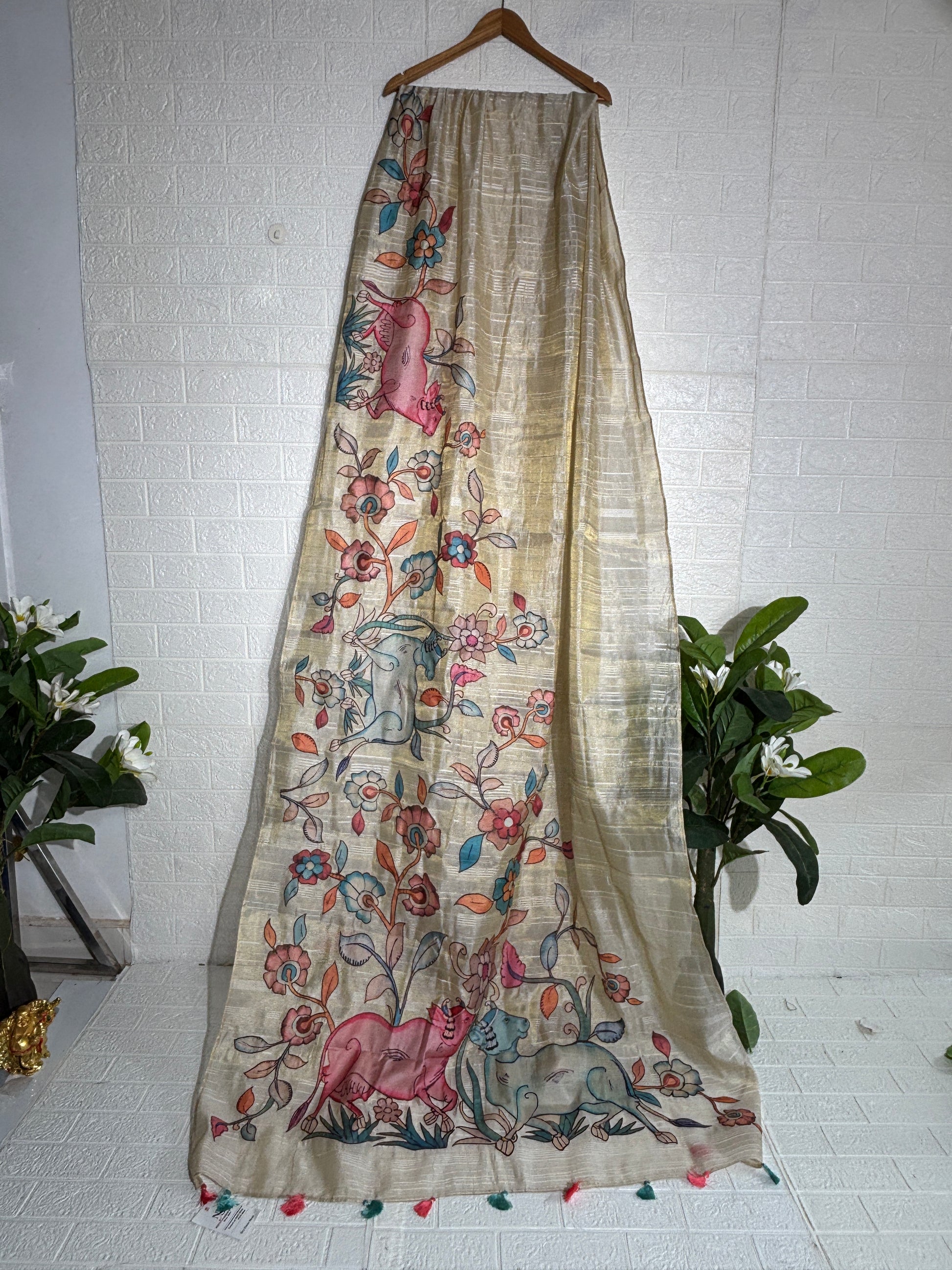 hand-painted silk saree featuring a Madhubani