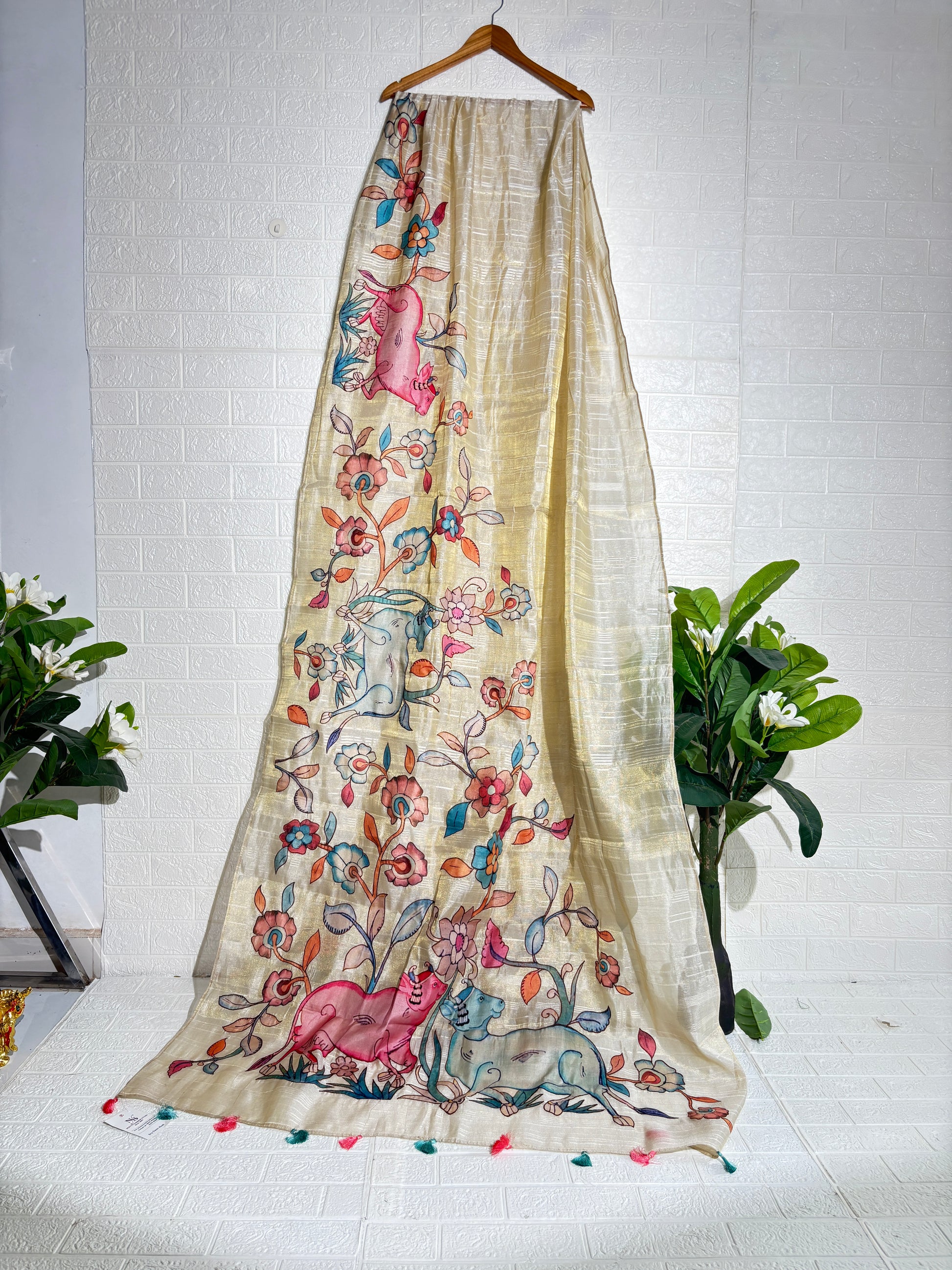 hand-painted silk saree featuring a Madhubani