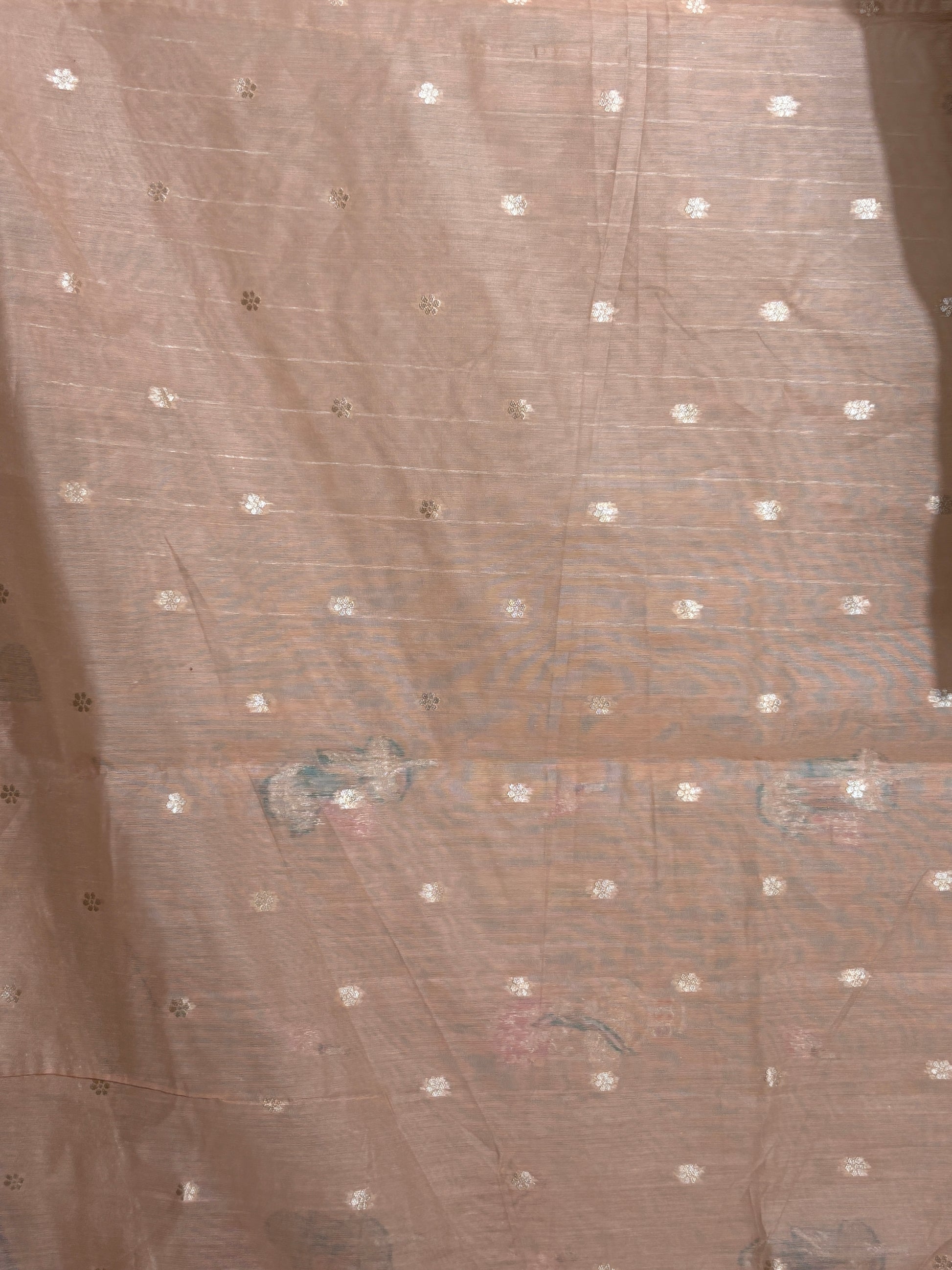 Woven Banarasi silk saree featuring traditional motifs of cows, trees, and floral elements