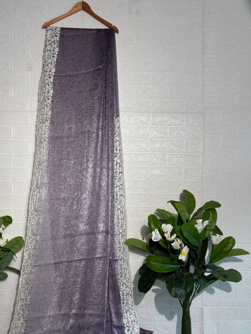 Shimmering Mauve Tissue Saree with Intricate Ivory Floral Border