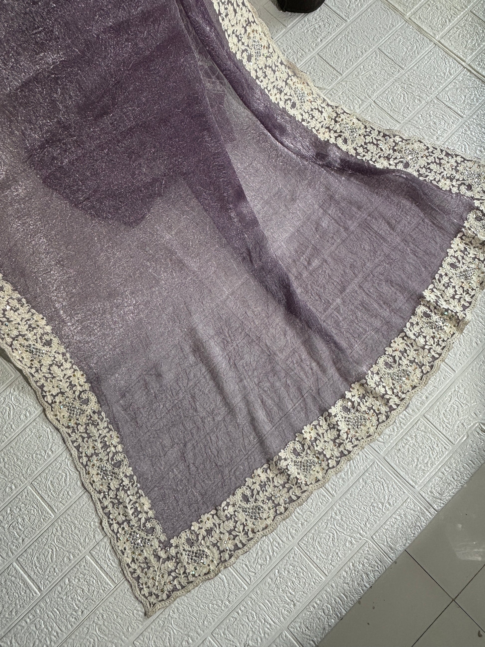 Shimmering Mauve Tissue Saree with Intricate Ivory Floral Border