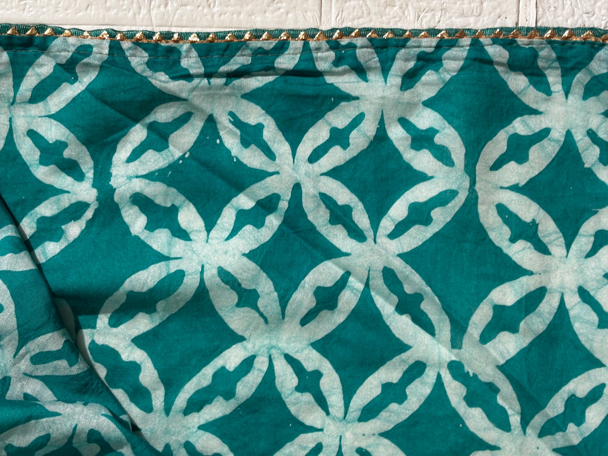 "Teal Green Bandhani Cotton Saree with White Motifs"