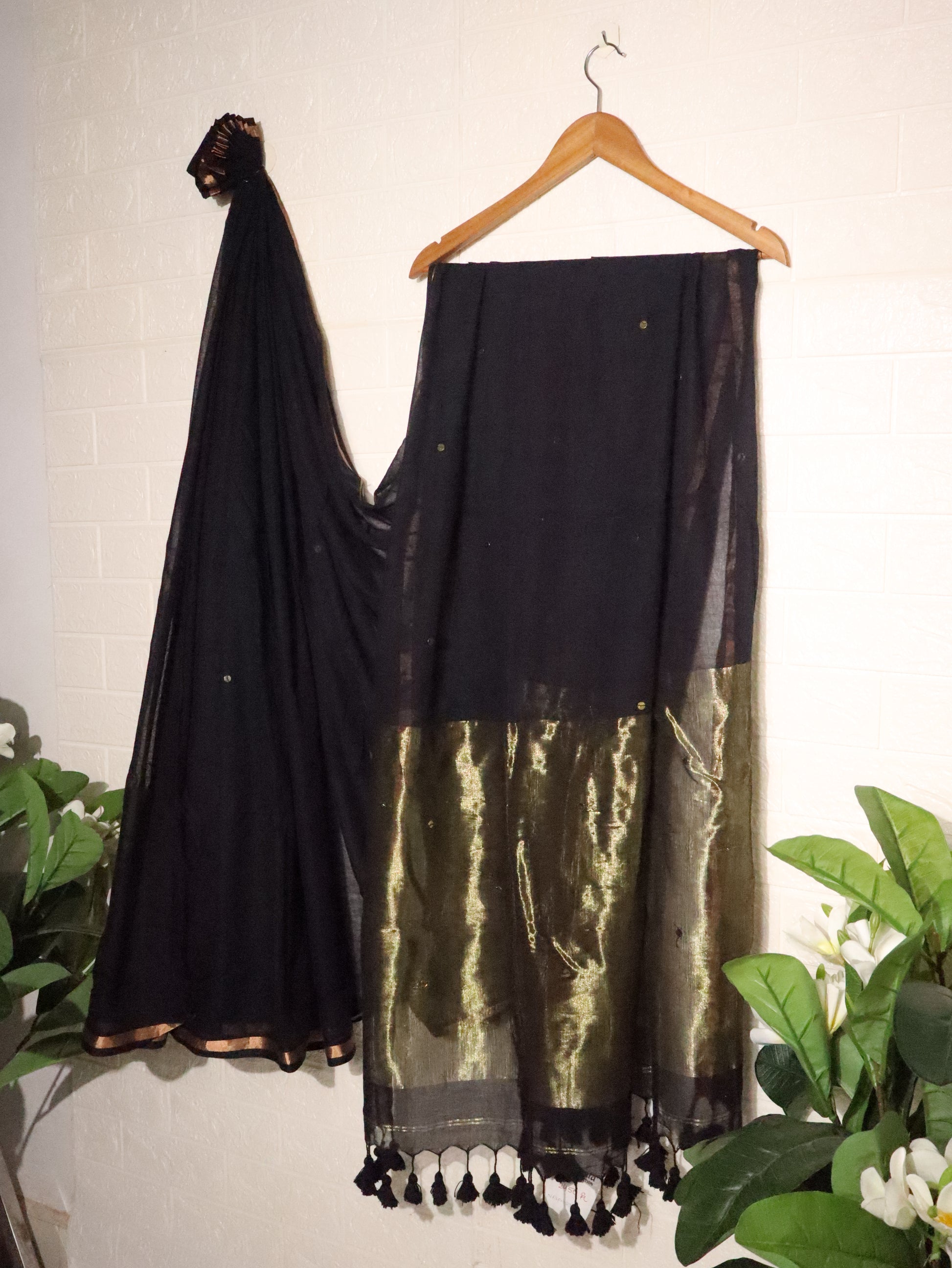 Elegant Black Handloom Saree with Gold Zari Pallu & Tassels