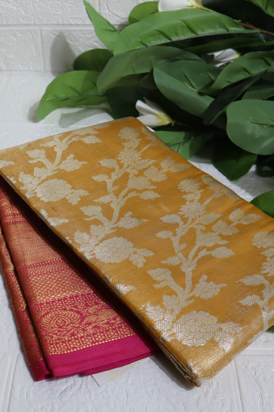 Mustard and Pink Banarasi Silk Saree with Silver Zari Floral Motifs