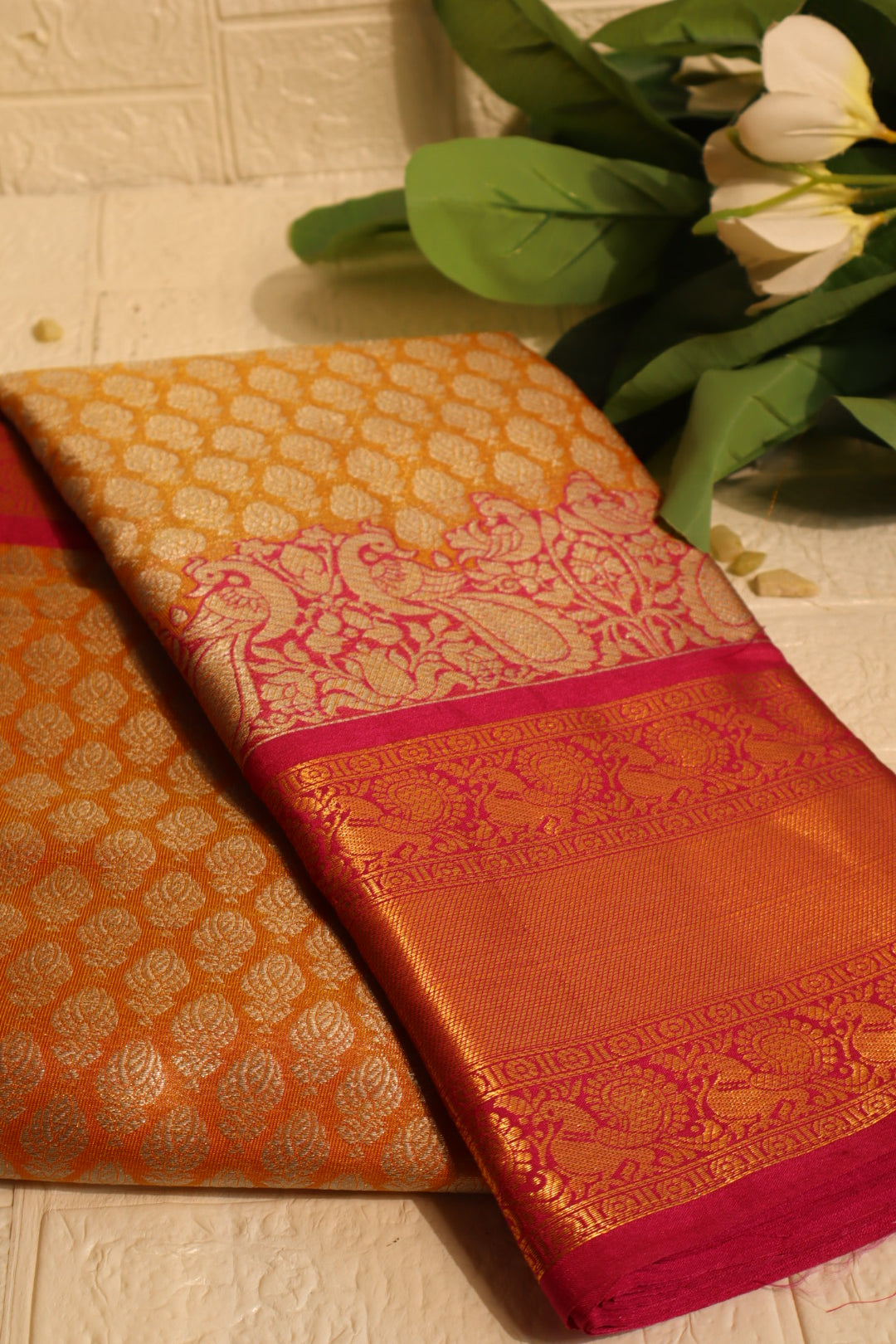 Orange and Pink Kanjivaram Silk Saree with Gold Zari and Peacock Motifs