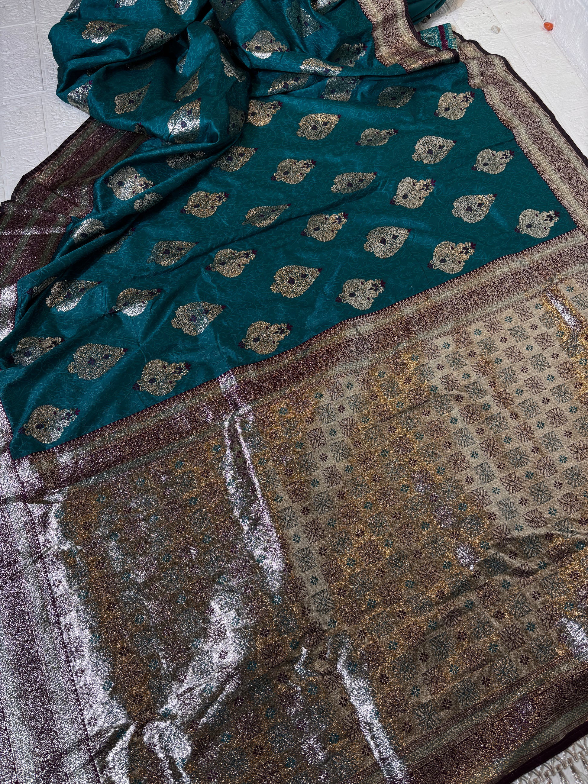 "Teal Blue Banarasi Silk Saree with Silver Zari Buttas"