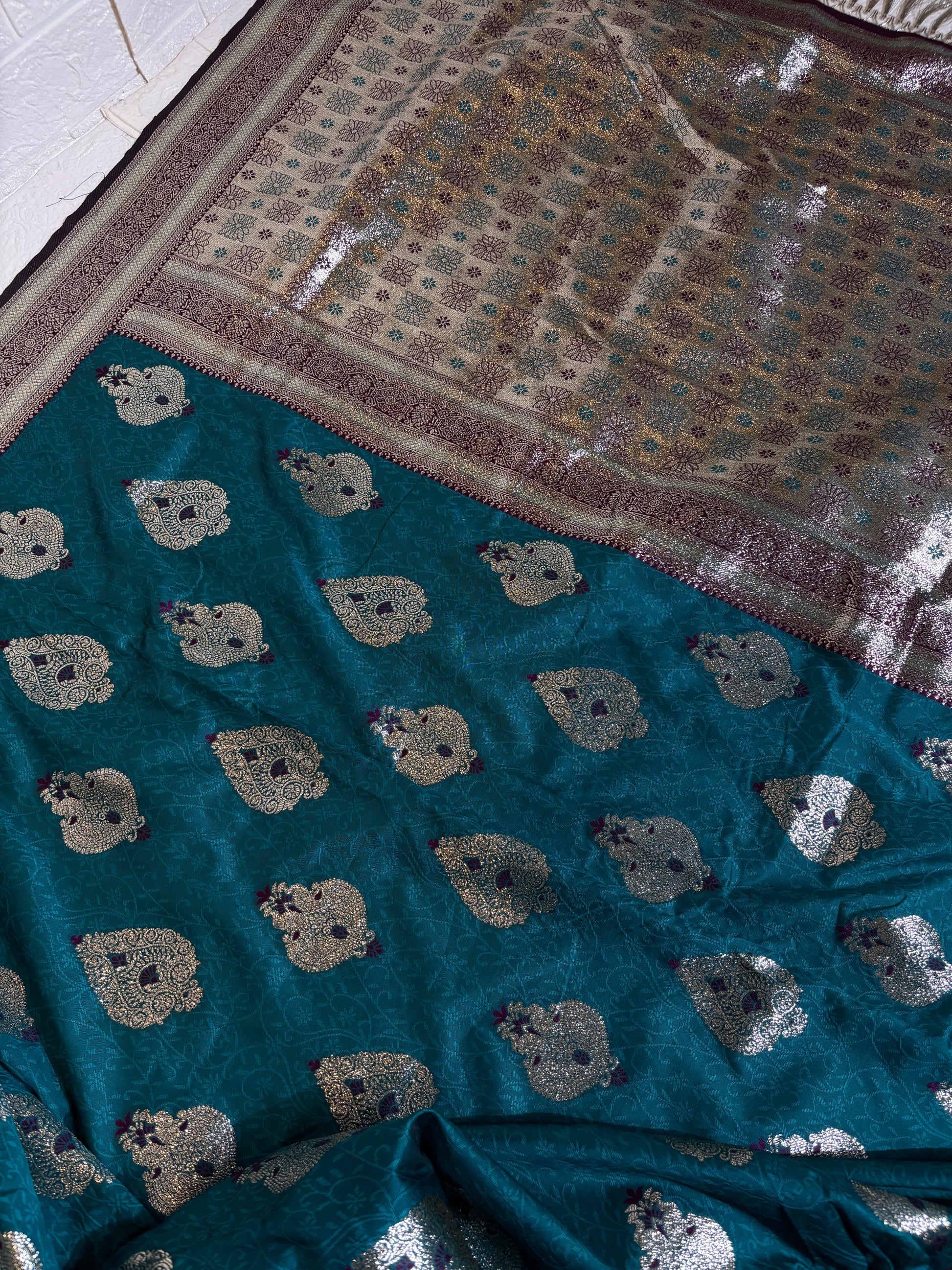 "Teal Blue Banarasi Silk Saree with Silver Zari Buttas"