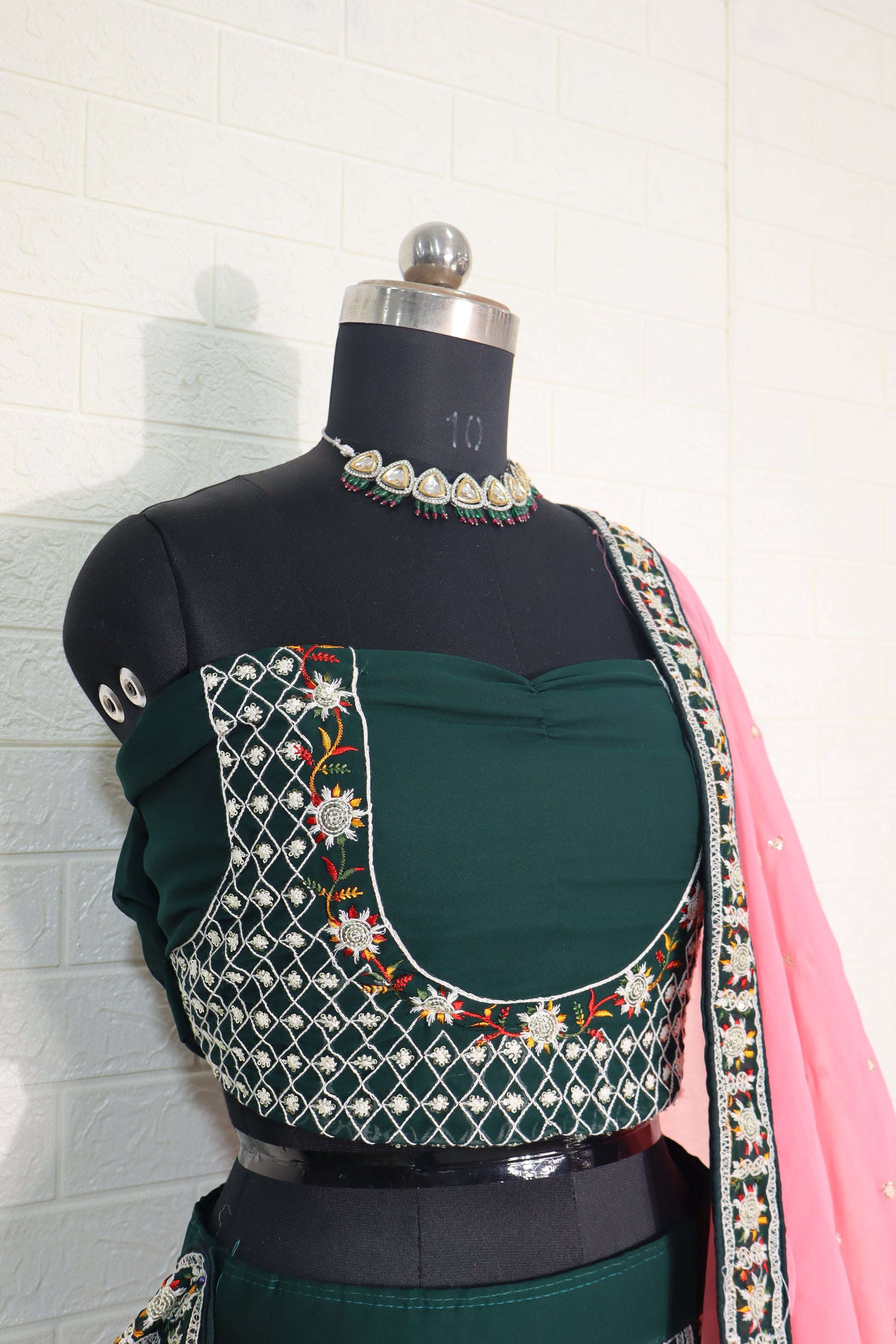 Embroidered Bottle Green Lehenga Choli with Pink Dupatta