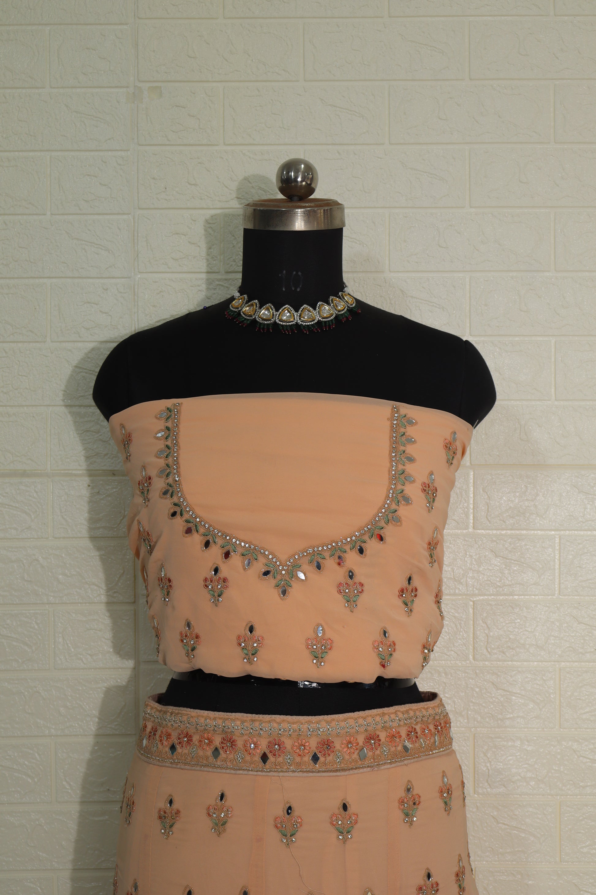 Peach Net Embroidered Lehenga Choli with Floral Detailing