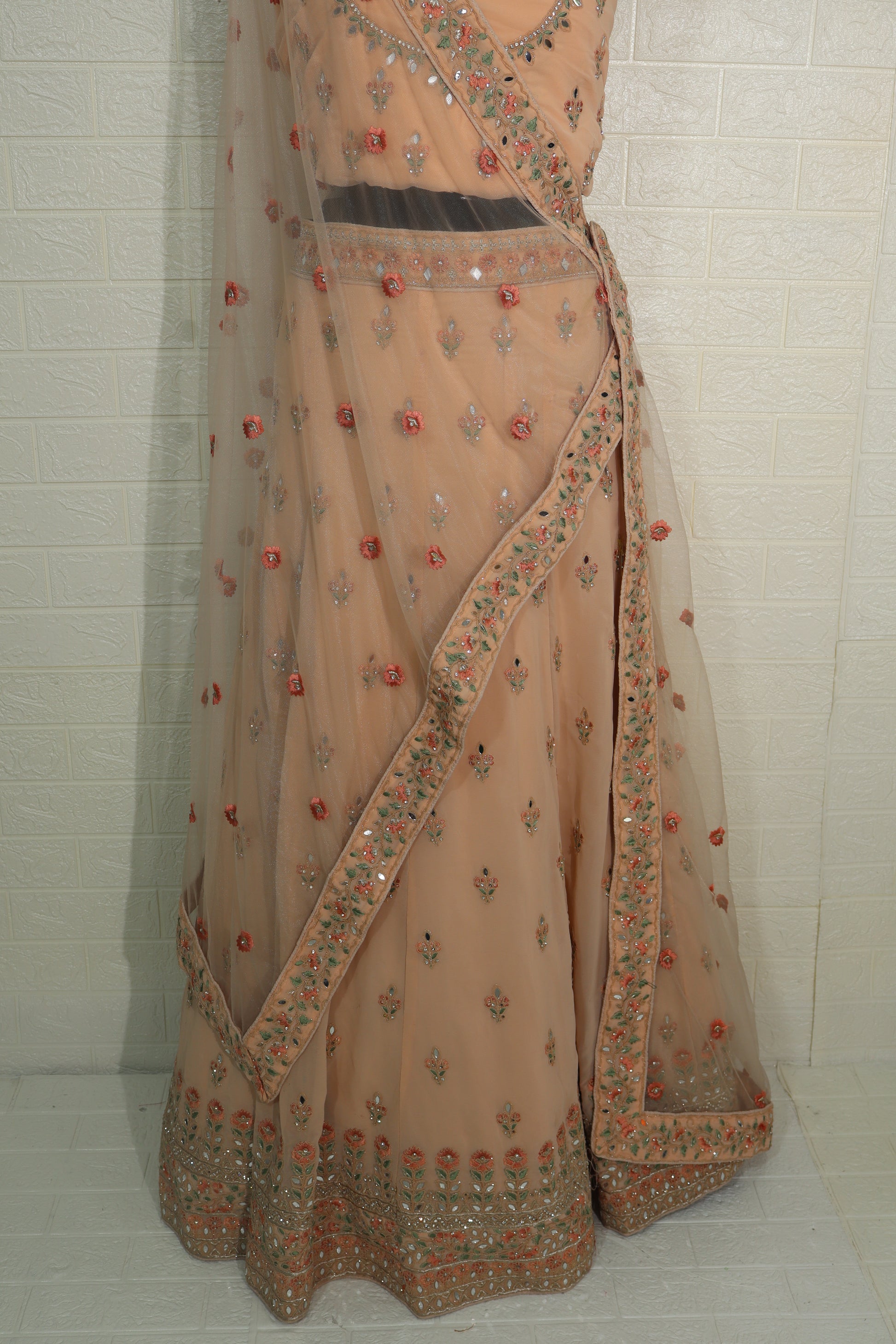 Peach Net Embroidered Lehenga Choli with Floral Detailing