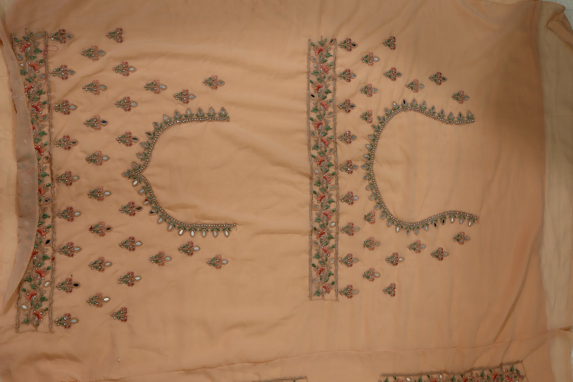 Peach Net Embroidered Lehenga Choli with Floral Detailing