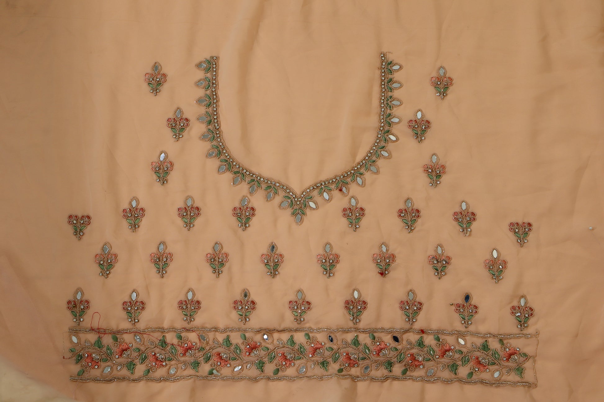 Peach Net Embroidered Lehenga Choli with Floral Detailing